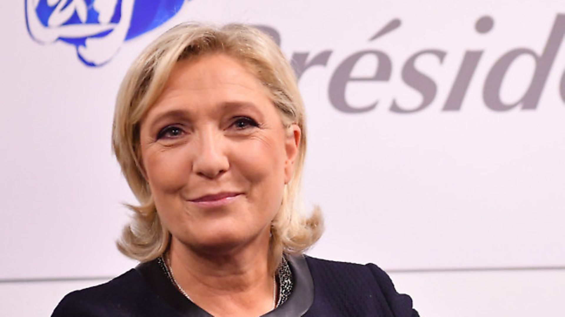 French far-right party Front National (FN) president and candidate for the 2017 presidential elections, Marine Le Pen poses in front of her campaign logo during the official inauguration of her campaign headquarters 'L'Escale', in Paris, France on November 16, 2016. Photo by Christian Liewig/ABACAPRESS.COM - Credit: ABACA/PA Images