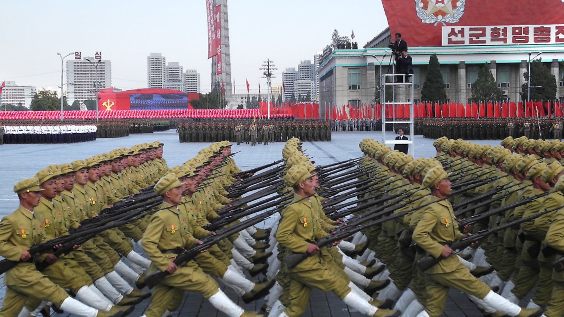 Soldiers march with bayonets during the military parade for the 70th anniversary of the founding of the ruling workers' party on Kim Il-Sung Square in Pyongyang, North Korea, 10 October 2015. - Credit: DPA/PA Images