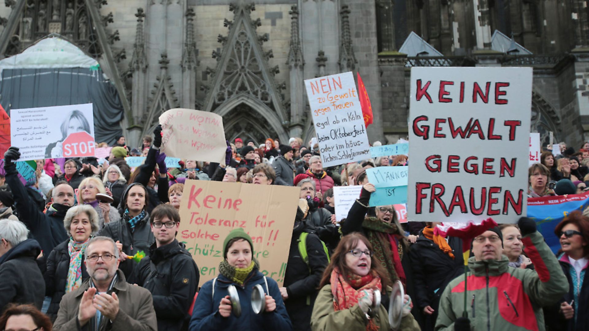 Protests outside Cologne cathedral against racism and sexism in the wake of sexual assaults on New Year's Eve 2015.PHOTO: OLIVER BERG/DPA - Credit: DPA/PA Images