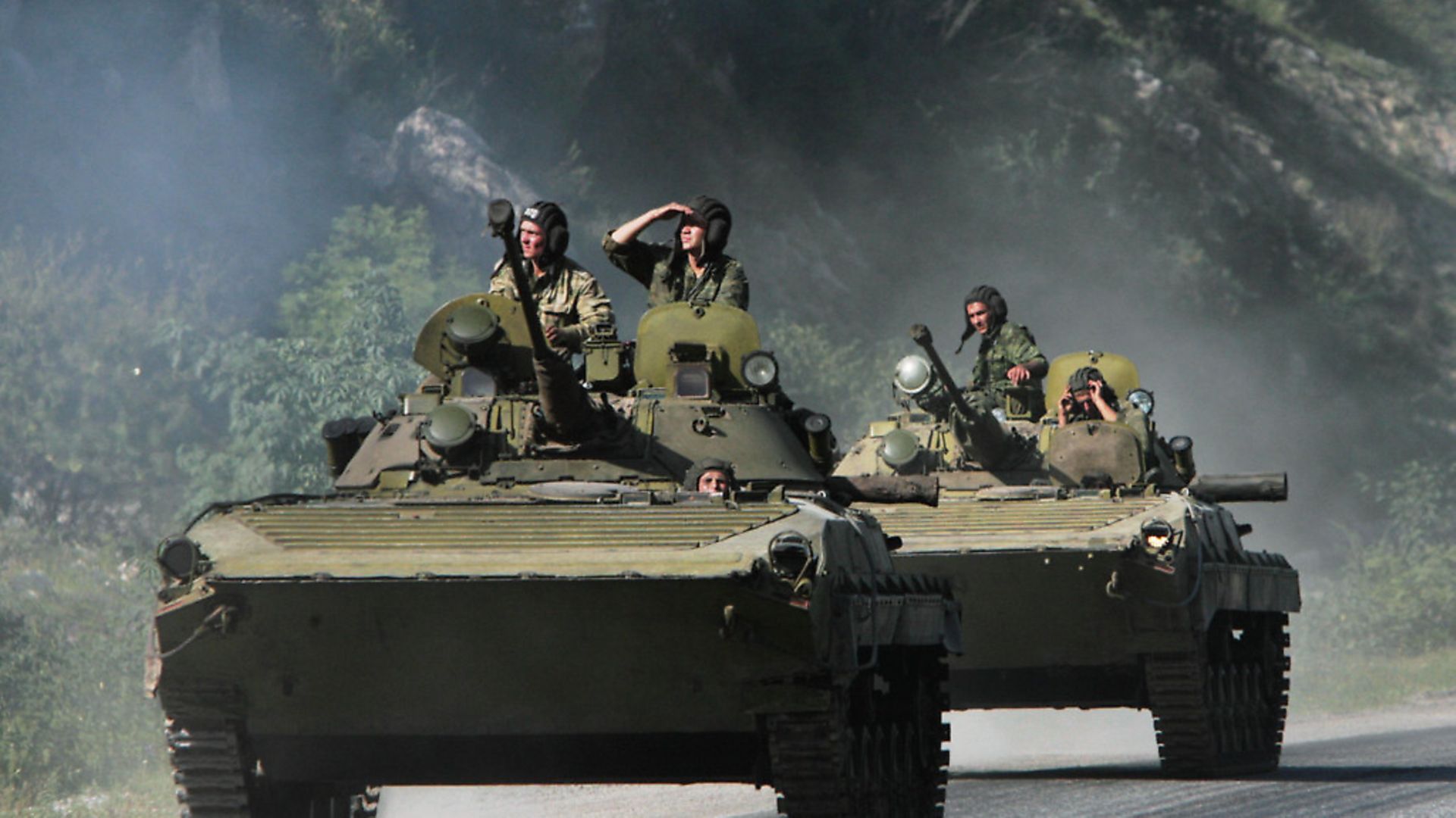 A convoy of Russian troops makes its way through the mountains in the direction of Tskhinvali near the town of Alagir in August 2008. Picture: Natalia Kolesnikova/AFP/Getty Images - Credit: AFP/Getty Images