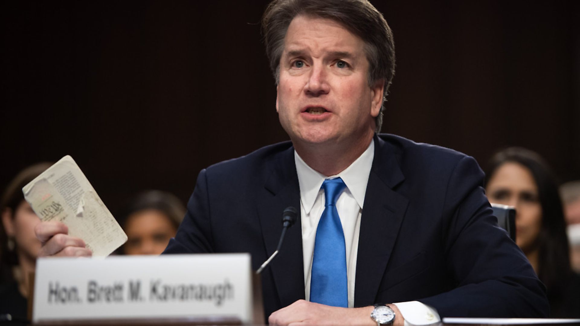Judge Brett Kavanaugh holds up a copy of the US Constitution as he testifies during the second day of his US Senate Judiciary Committee confirmation hearing to be an Associate Justice on the US Supreme Court, on Capitol Hill in Washington, DC, September 5, 2018. (SAUL LOEB/AFP/Getty Images) - Credit: AFP/Getty Images