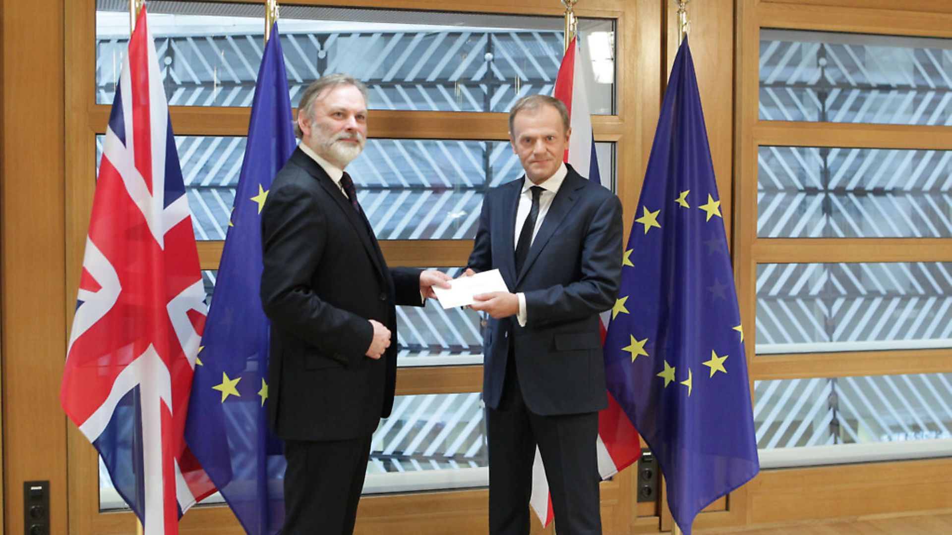 Britain's ambassador to the European Union, Sir Tim Barrow hand delivers prime minister Theresa May's Brexit letter giving notice of the UK's intention to leave the EU under Article 50 of the Lisbon Treaty to EU Council president Donald Tusk, in Brussels. Picture: Alexander Britton/PA Wire/PA Images. - Credit: PA Wire/PA Images