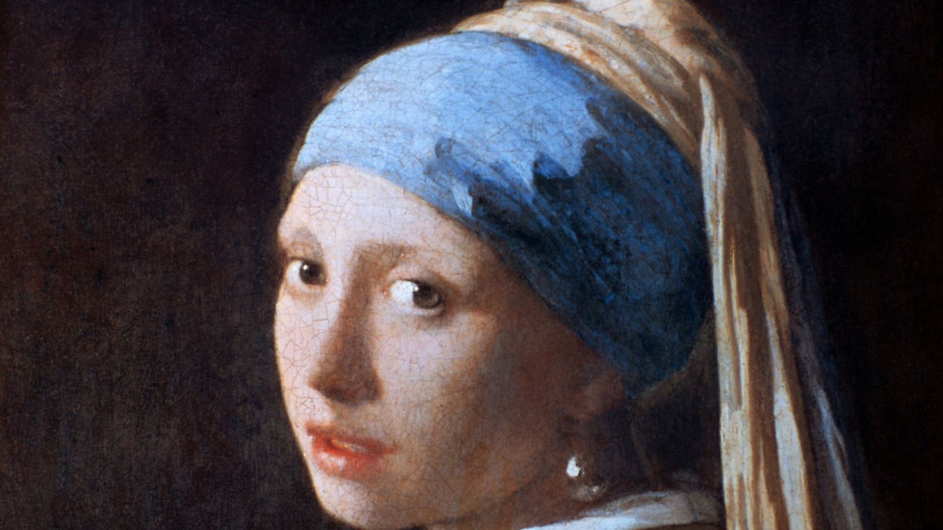 'Girl with a Pearl Earring', c1665. The girl's headdress has an exotic effect. Turbans were a popular fashionable accessory in Europe as early as the 15th century. It has been suggested that the pearl in Vermeer's painting is a symbol of chastity. From the collection of the Mauritshuis, the Hague, Netherlands. (Photo by Art Media/Print Collector/Getty Images) - Credit: Print Collector/Getty Images
