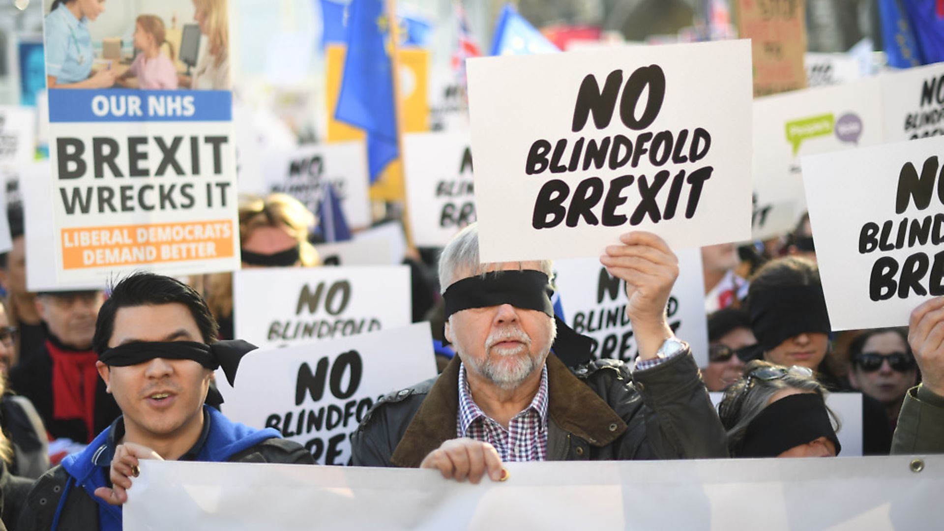 People's Vote supporters wearing blindfolds and carrying placards assemble in Parliament Square ahead of the Brexit debate in the House of Commons. Photograph: Stefan Rousseau/PA Wire. - Credit: PA