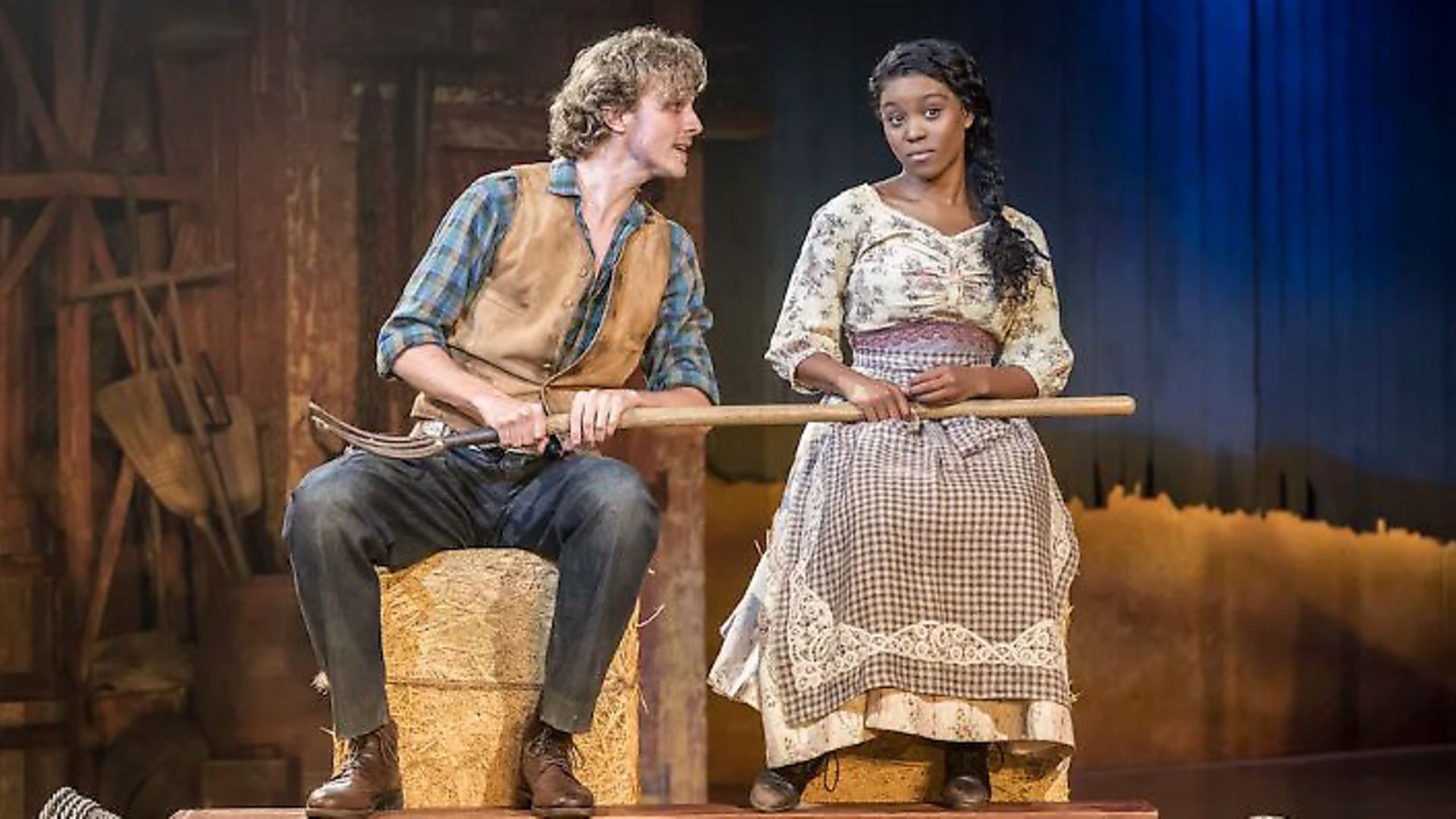 Hyoie O'Grady as Curly and Amara Okereke as Laurey in Oklahoma! at Chichester Festival Theatre. Picture: Johan Persson - Credit: Archant