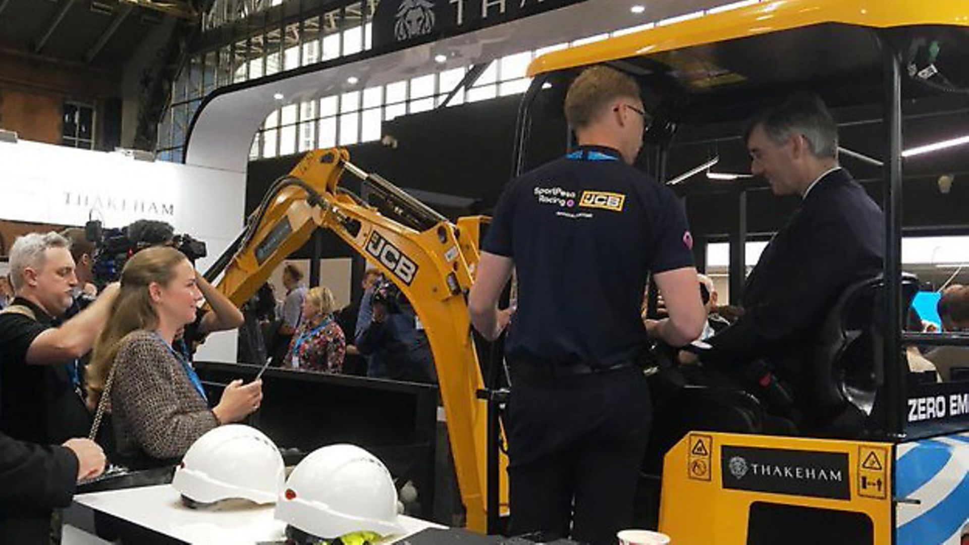 Jacob Rees-Mogg sits in a JCB digger. Photograph: Twitter. - Credit: Archant