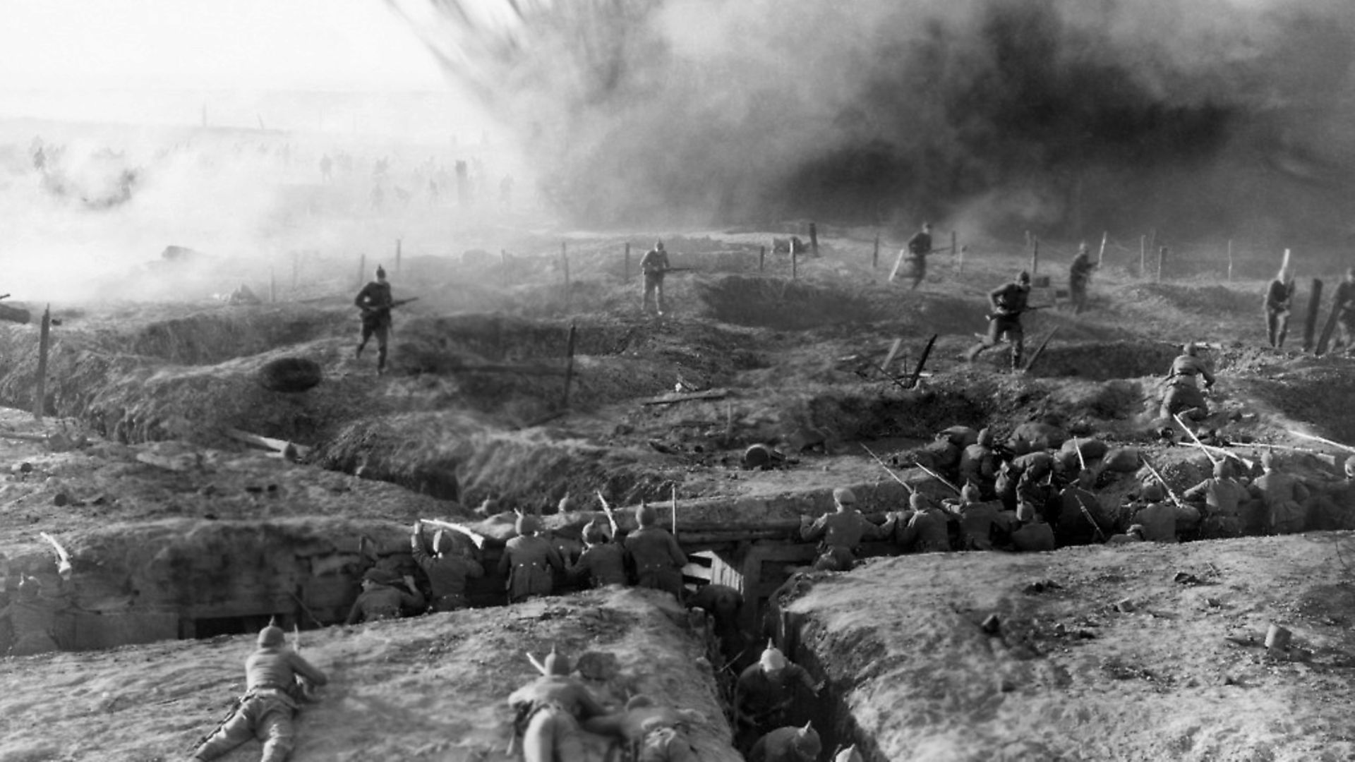 Soldiers take refuge in trenches in the 1930 film All Quiet on the Western Front. Photo: John Springer Collection/CORBIS/Corbis via Getty Images - Credit: Corbis via Getty Images