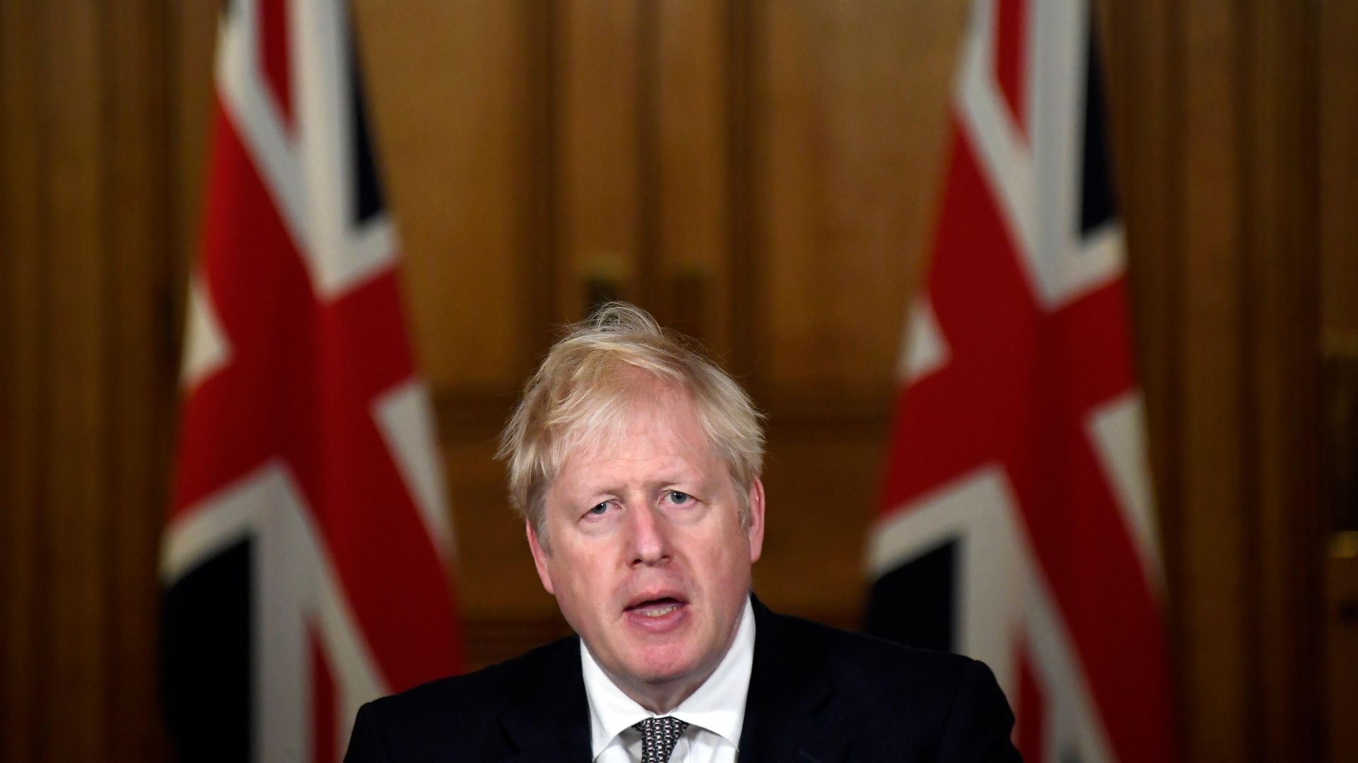 Britain's Prime Minister Boris Johnson speaks during a press conference in 10 Downing Street - Credit: Getty Images