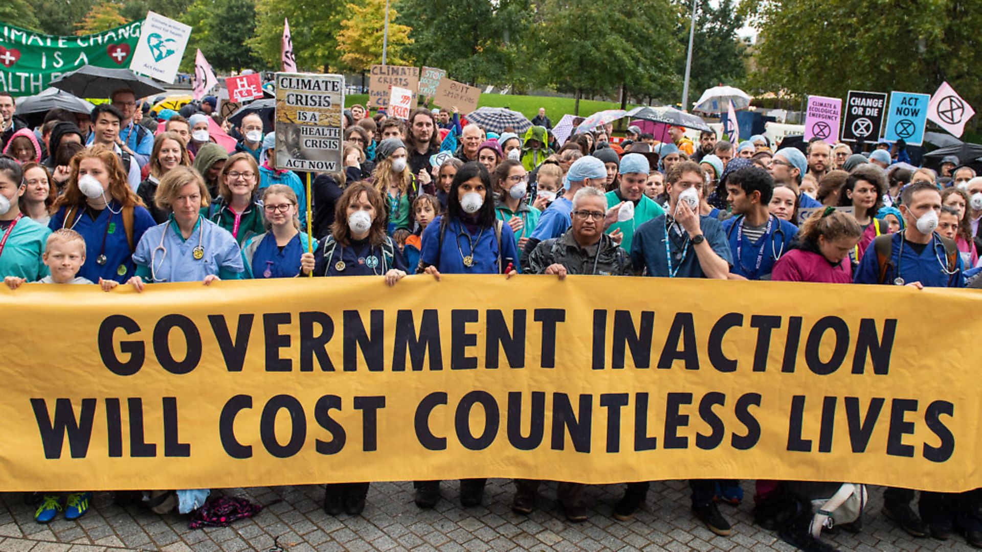 Doctors gather to protest in support of Extinction Rebellion in, London, to highlight deaths caused by air pollution. Photograph: Dominic Lipinski/PA. - Credit: PA Wire/PA Images