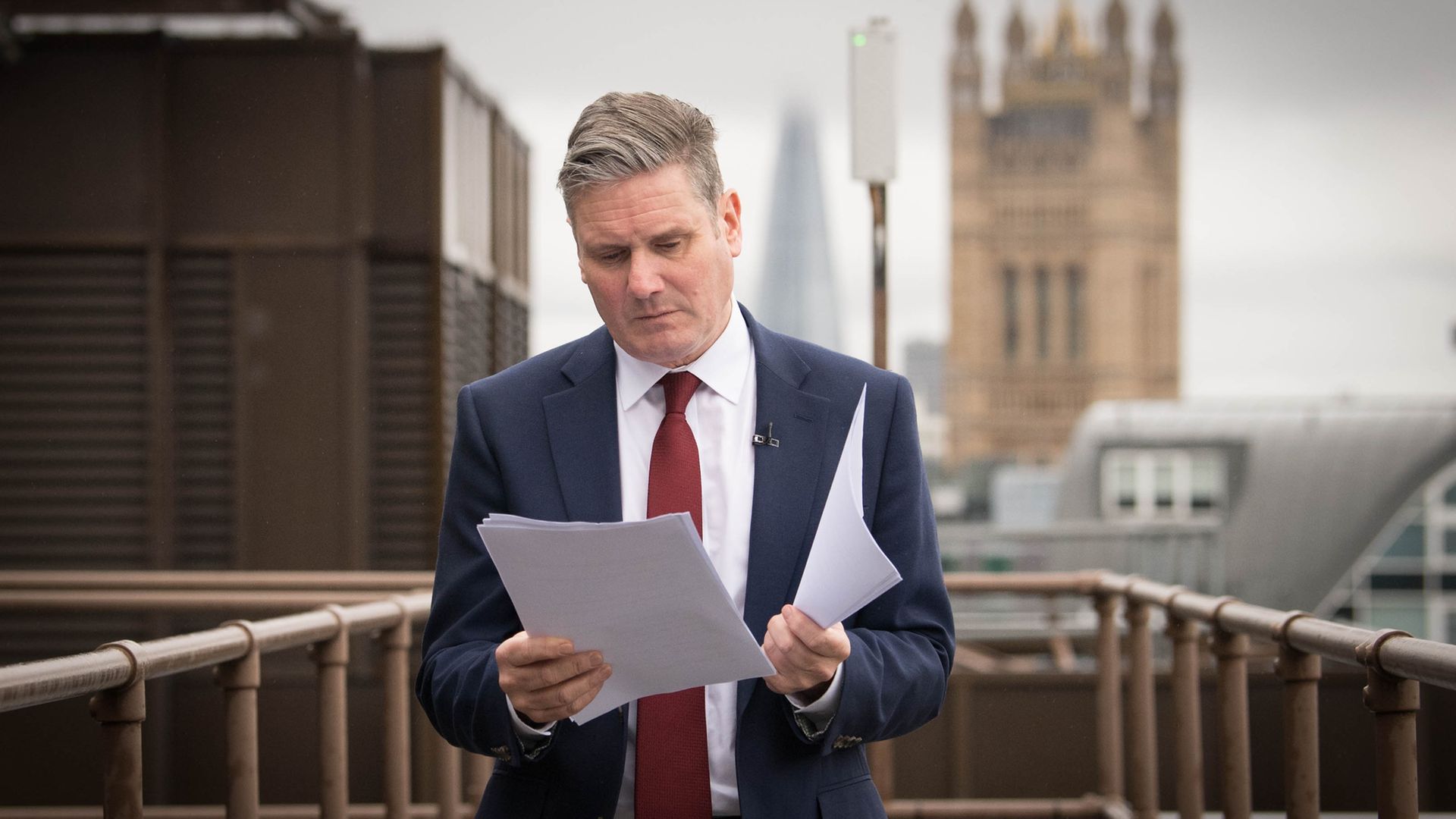 Labour leader Sir Keir Starmer reads through his notes shortly before delivering a virtual speech - Credit: PA