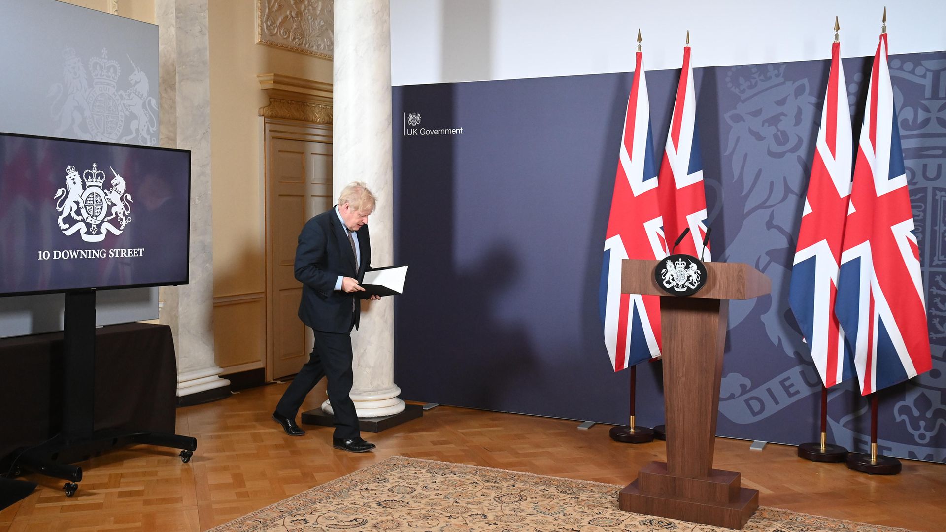 Boris Johnson arrives for a media briefing in Downing Street on the post-Brexit trade deal - Credit: PA