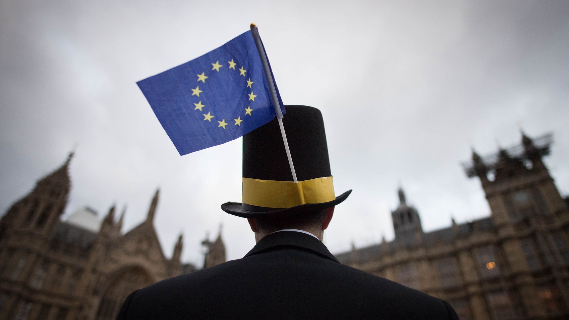 A pro-European campaigner outside the Houses of Parliament - Credit: PA