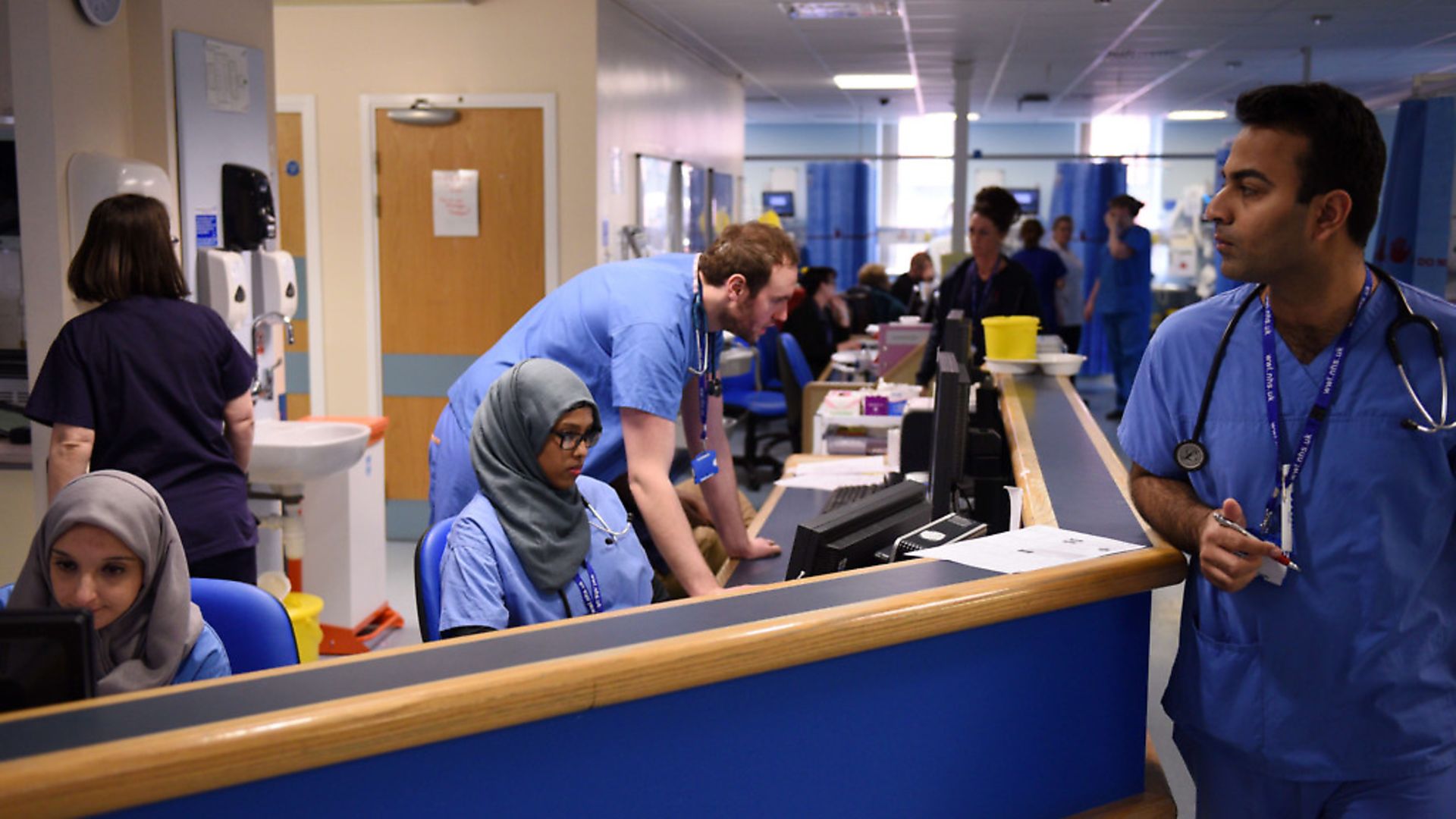 Mitch Benn says that immigration is not the drain on the NHS that some claim it to be  but, in fact, a vital part of it. Picture: OLI SCARFF/AFP via Getty Images. - Credit: AFP via Getty Images