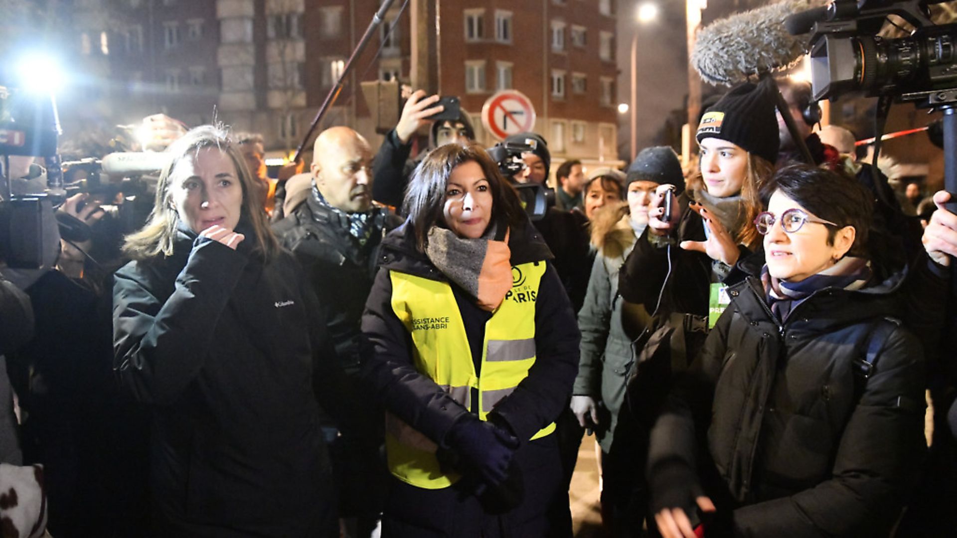 Mayor of Paris Anne Hidalgo walk with police forces evacuating migrants early morning in Paris. (Photo by Julien Mattia/Anadolu Agency via Getty Images) - Credit: Anadolu Agency via Getty Images