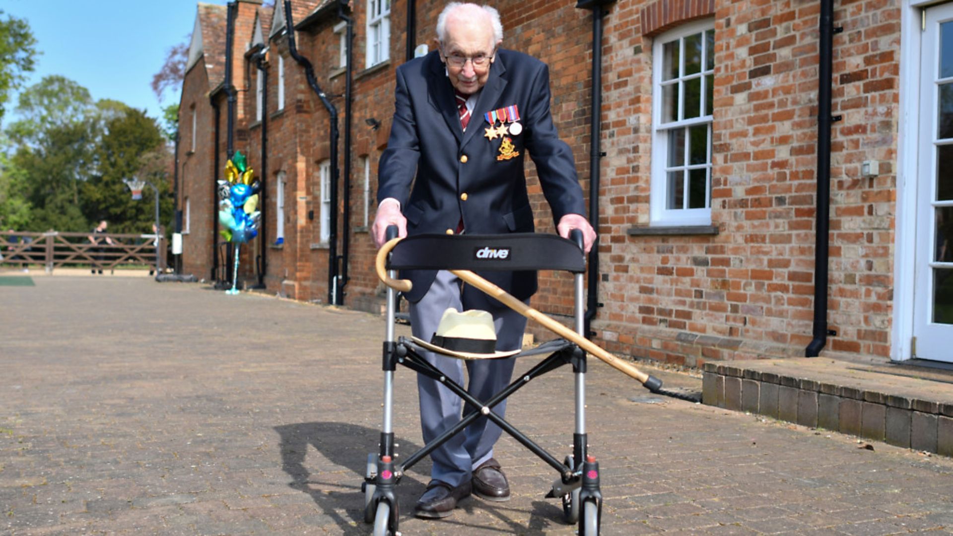 Captain Tom Moore - Credit: AFP via Getty Images