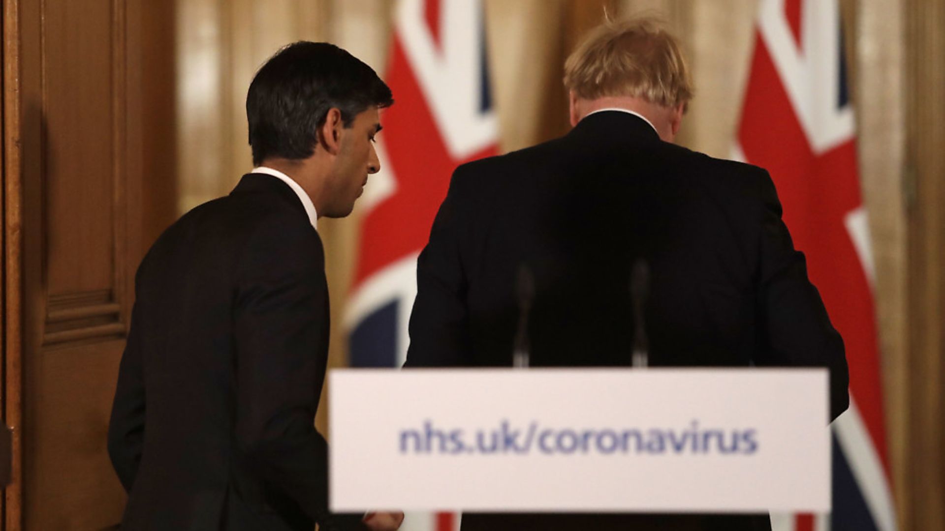 Chancellor Rishi Sunak with Prime Minister Boris Johnson leave after a media briefing in Downing Street. Photograph: Matt Dunham/PA Wire. - Credit: PA