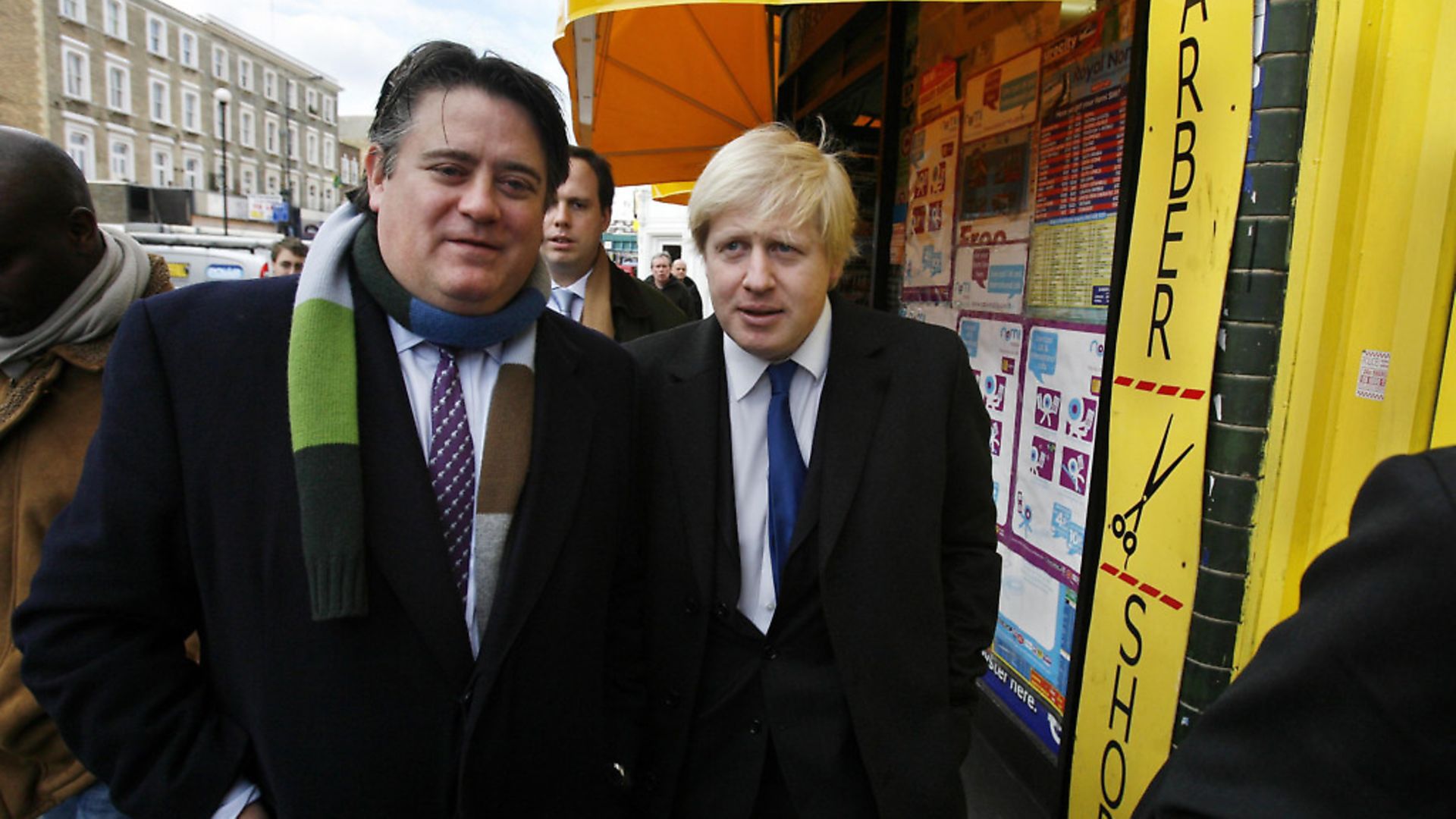 Boris Johnson walks along Goldhawk Road in Shepherd's Bush with Stephen Greenhalgh. Photograph: Johnny Green/PA. - Credit: PA