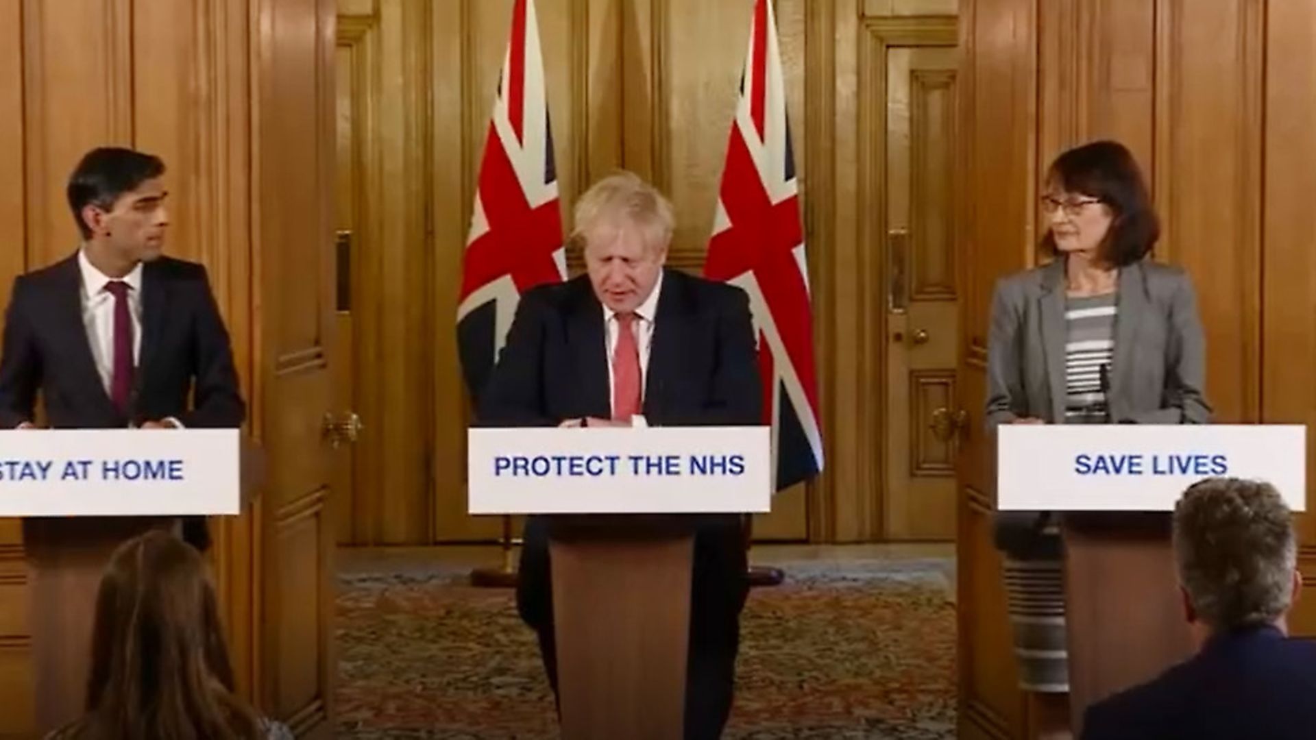 A screen-grab of Prime Minister Boris Johnson (centre), Chancellor Rishi Sunak (left) and Dr Jenny Harries (right) speaking at a media briefing in Downing Street, London, on coronavirus (COVID-19). PA Photo. Picture date: Friday March 20, 2020. See PA story HEALTH Coronavirus. Photo credit should read: PA Video/PA Wire - Credit: PA