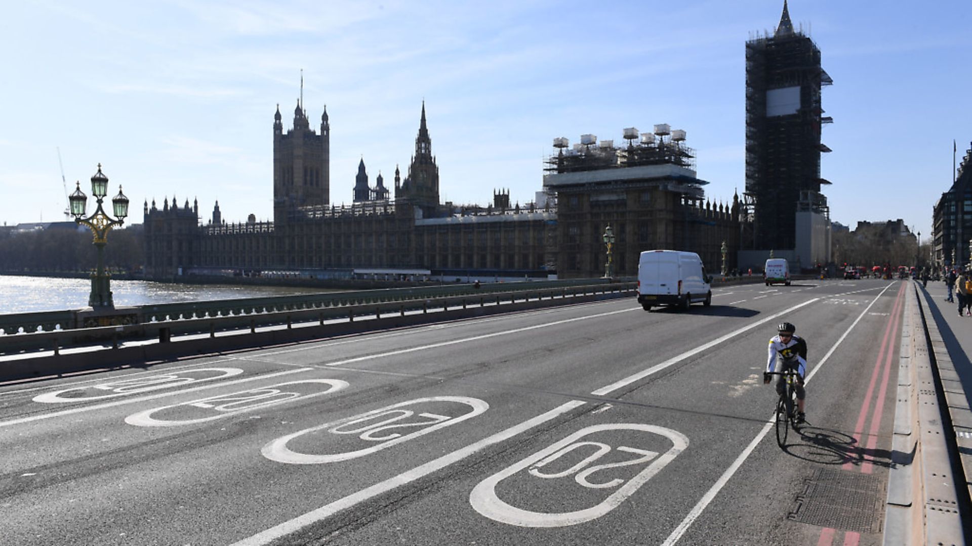 A near empty Westminster Bridge and the Houses of Parliament in Westminster, the day after  Boris Johnson put the UK in lockdown to help curb the spread of the coronavirus. Photograph: Stefan Rousseau/PA Wire. - Credit: PA