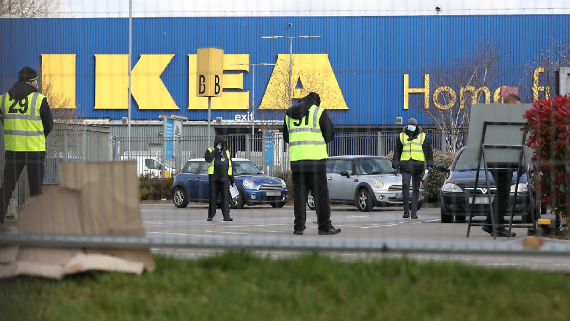 Stewards organise traffic at a coronavirus test centre for NHS workers which has opened at Ikeas store in Wembley, north-west London. Photograph: Jonathan Brady/PA Wire. - Credit: PA