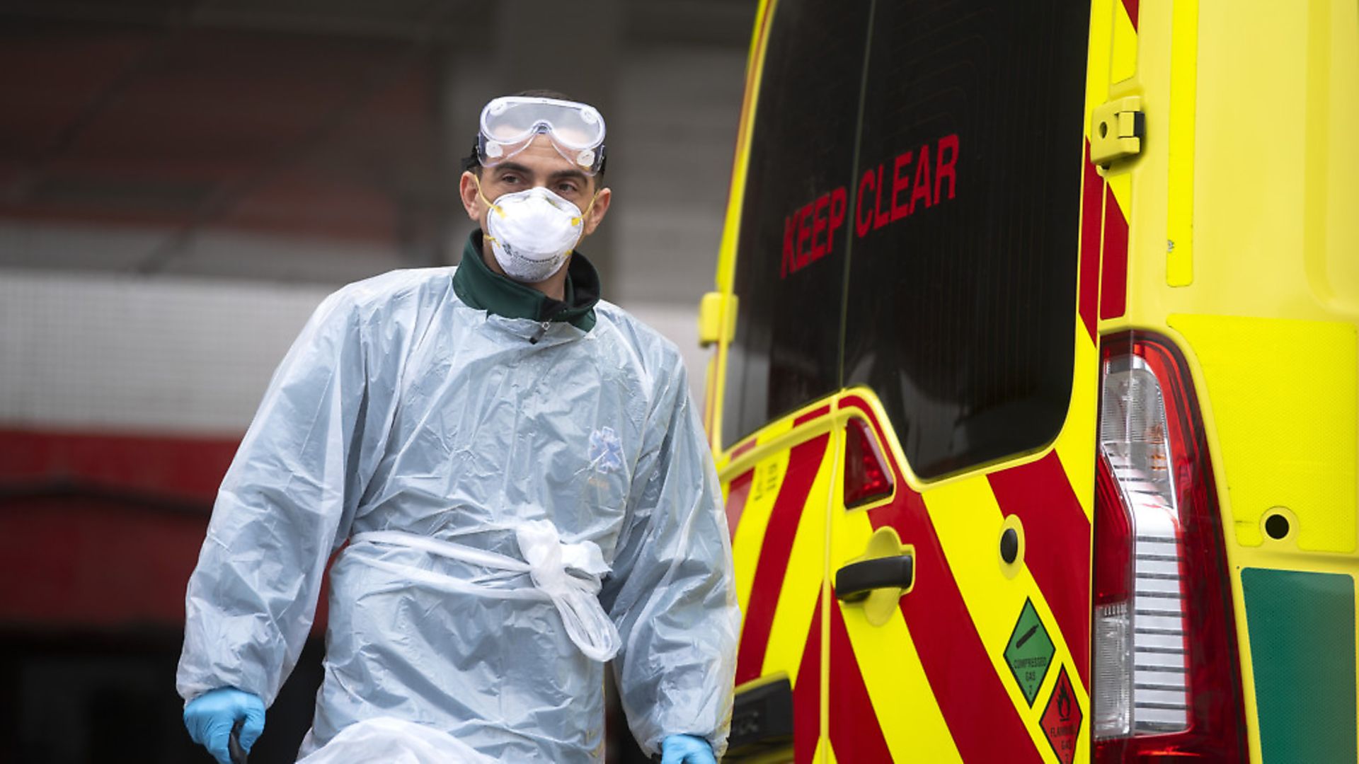 A London Ambulance worker wearing PPE at St Thomas' Hospital in London as the UK continues in lockdown to help curb the spread of the coronavirus. Photograph: Victoria Jones/PA. - Credit: PA