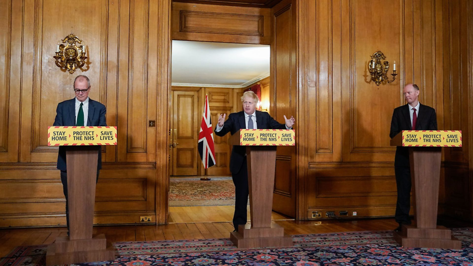 Chief Scientific Adviser Sir Patrick Vallance,  Prime Minister Boris Johnson and Chief Medical Officer Chris Whitty during a media briefing in Downing Street, London, on coronavirus (COVID-19). Photograph: Andrew Parsons/10 Downing Street/Crown Copyright/PA Wire. - Credit: PA