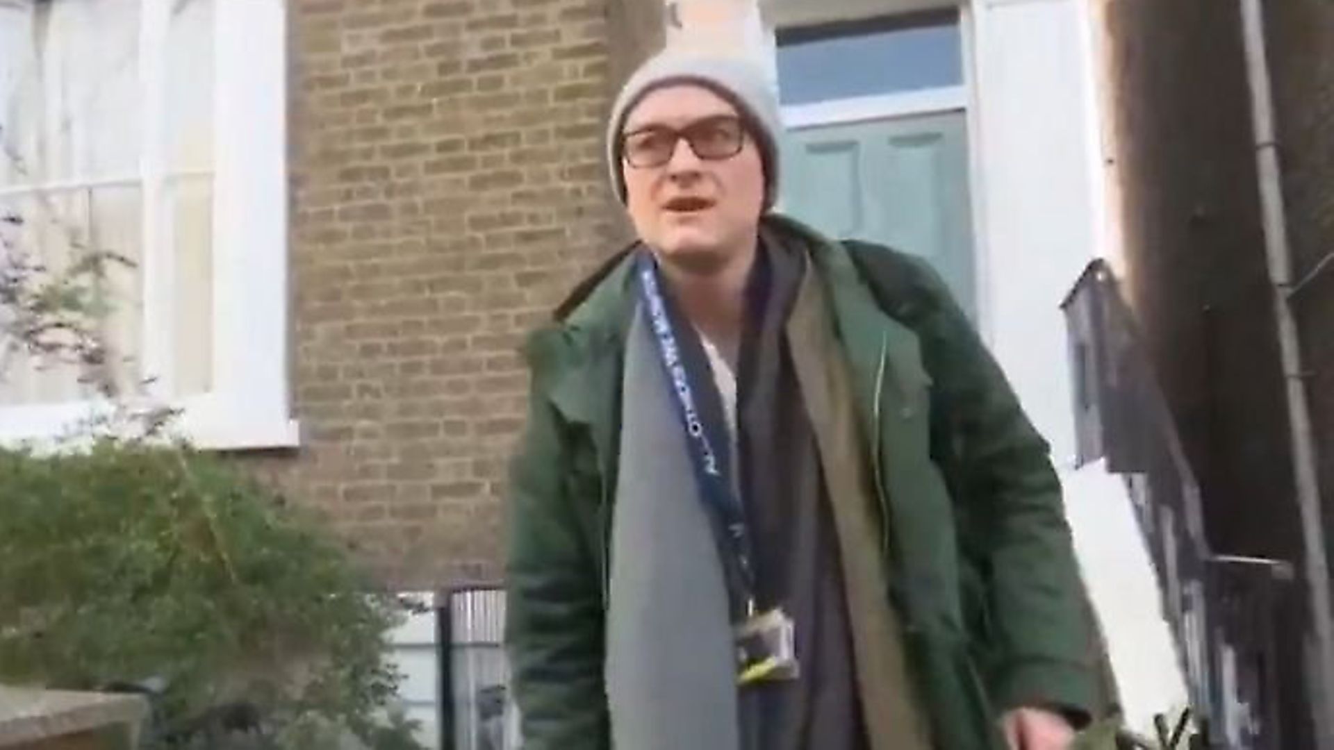 Dominic Cummings is questioned by reporters as he leaves his home in London. Photograph: Sky News. - Credit: Archant