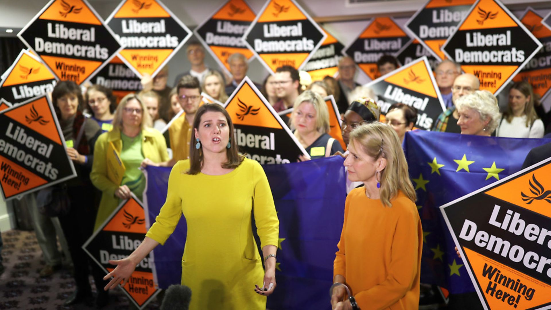 Jo Swinson appears in front of EU flags and Lib Dem signs. Photograph: Aaron Chown/PA. - Credit: PA Wire/PA Images
