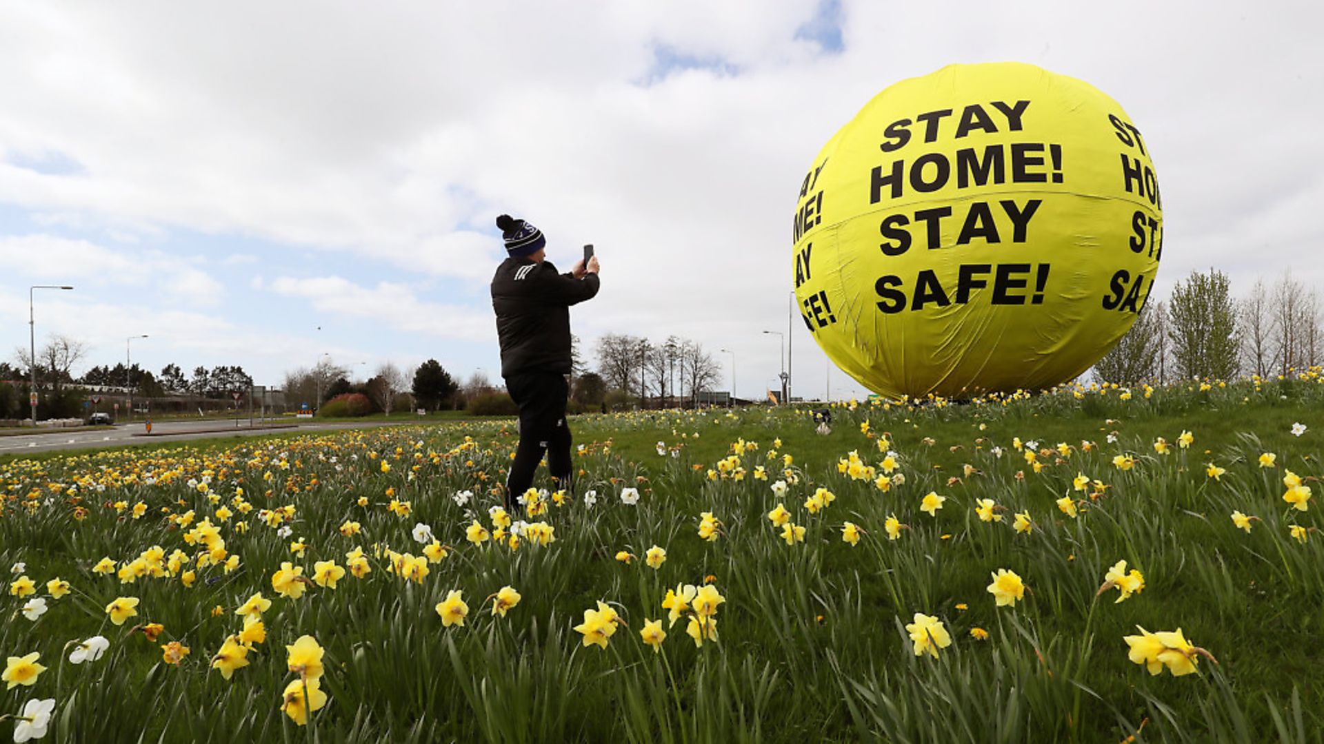 A high-profile 'Stay Home Stay Safe' sign in Kildare during the coronavirus lockdown. Photograph: Brian Lawless/PA. - Credit: PA