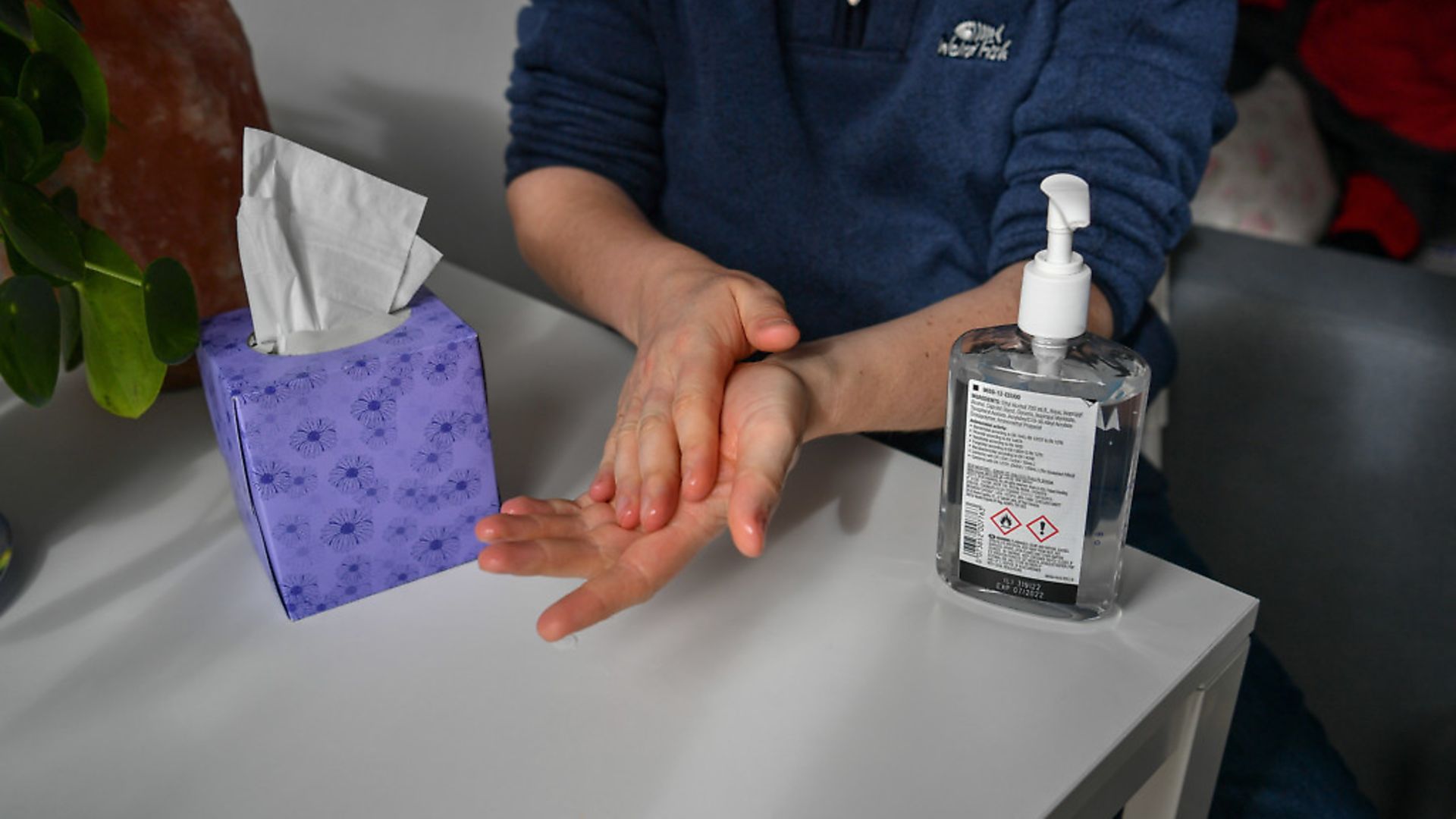A man uses hand sanitiser gel. Photograph: Ben Birchall/PA Wire. - Credit: PA