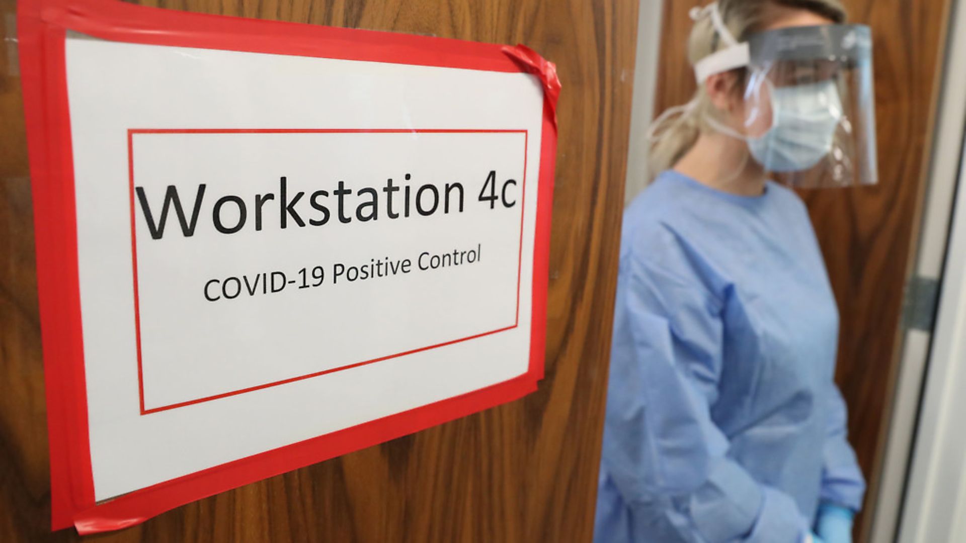 Technicians  during the opening of the new Covid-19 testing lab at Queen Elizabeth University Hospital, Glasgow. Photograph: Andrew Milligan/PA Wire. - Credit: PA