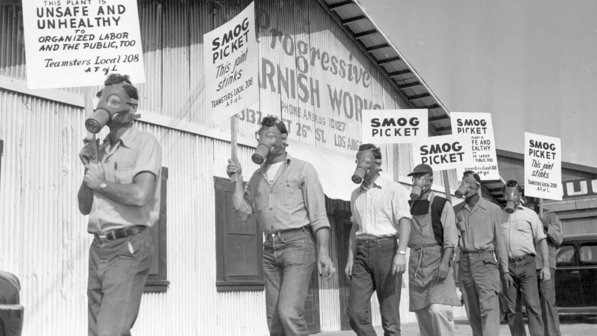Protesters complain about the stench from a Los Angeles varnish factory in 1949. Their slogan was "this joint stinks!" - Credit: Bettmann Archive