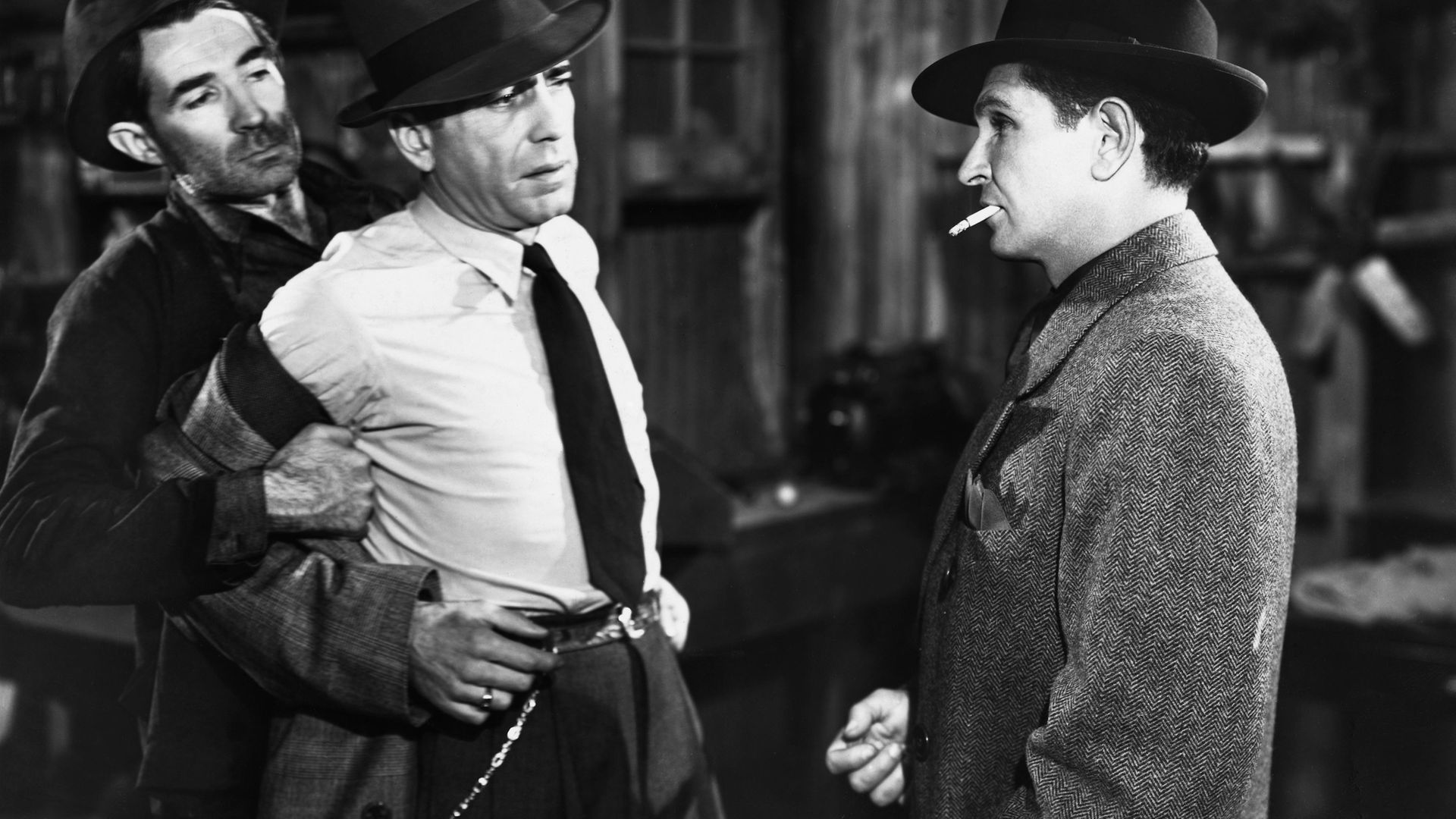 Humphrey Bogart, in The Big Sleep, as Philip Marlowe, the dogged private eye who snoops into the privacy of suspects. Or should that be 'prye-vacy'? - Credit: Corbis via Getty Images