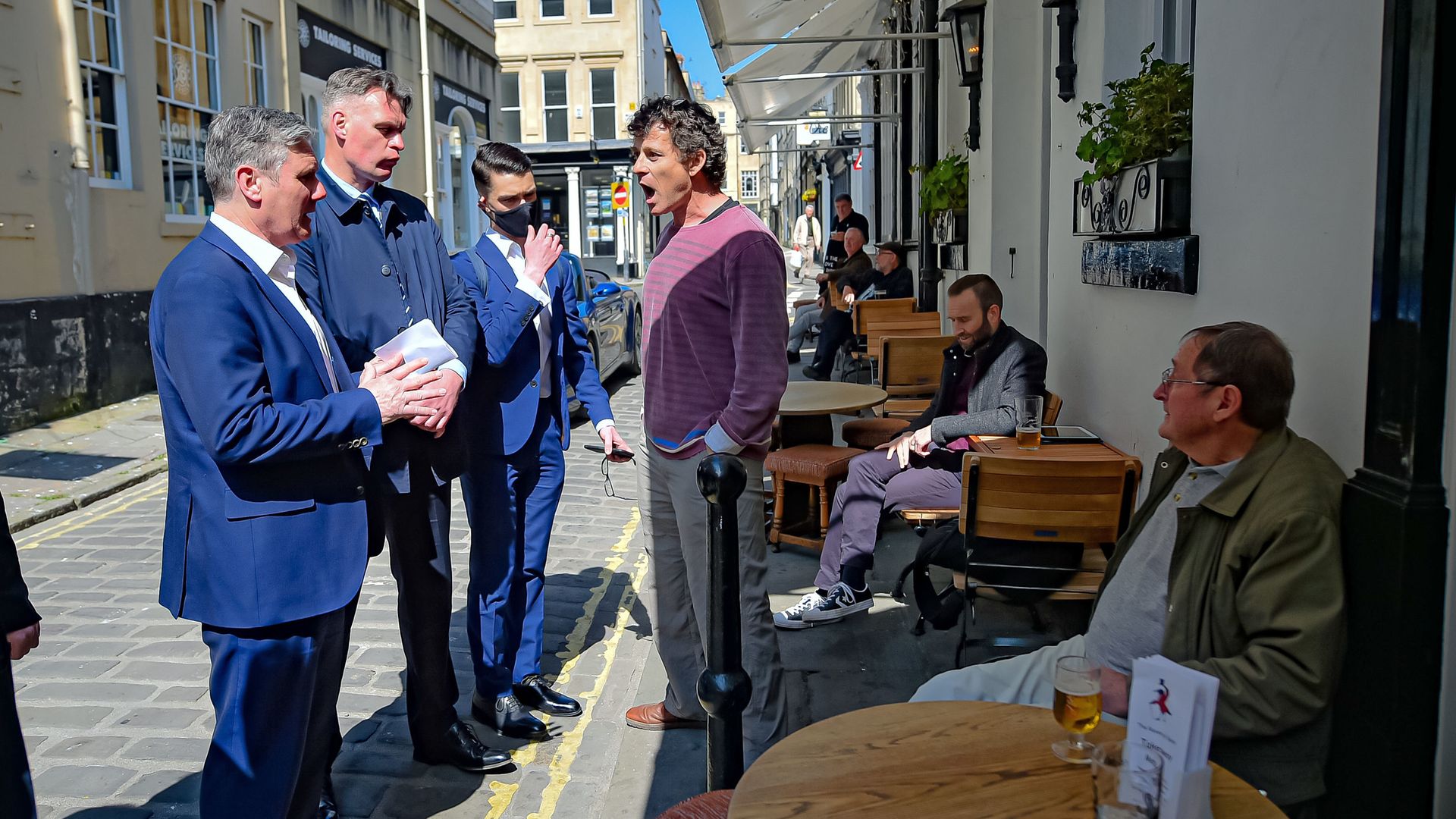 Labour leader Sir Keir Starmer listens to Rod Humphris,  The Raven pub in Bath, shout at him on Monday April 19, 2021 - Credit: Ben Birchall/PA Wire/PA Images