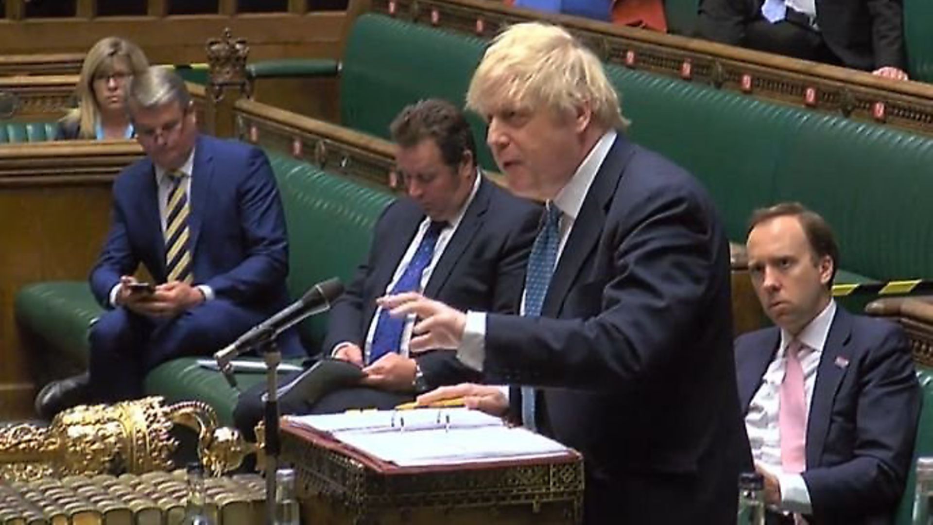 Boris Johnson is watched by Matt Hancock during PMQs in the House of Commons. Photograph: Parliament TV. - Credit: Archant
