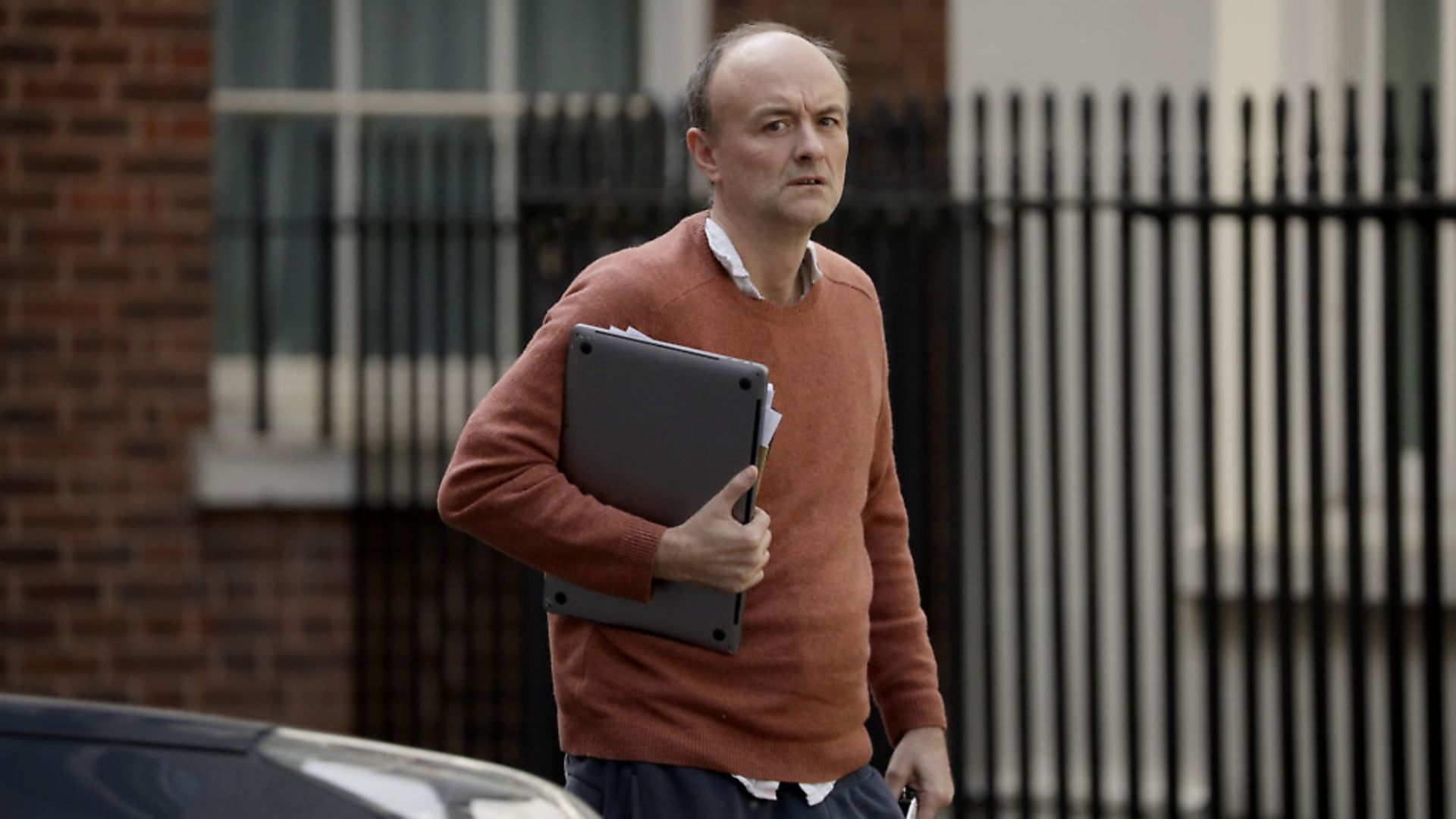 Dominic Cummings, special adviser to British Prime Minister Boris Johnson, walks into 10 Downing Street. (AP Photo/Matt Dunham) - Credit: AP