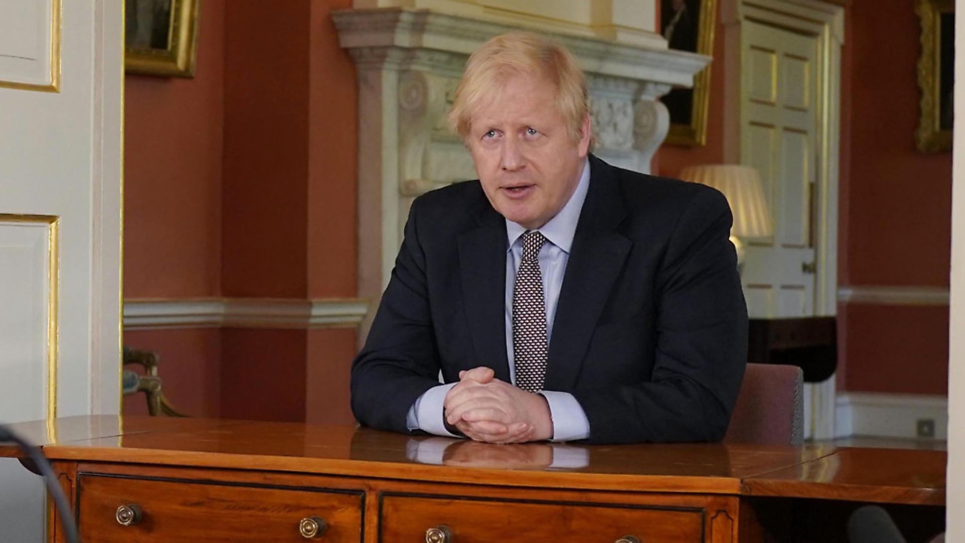 Prime Minister Boris Johnson addressing the nation about coronavirus from 10 Downing Street. Photo: Andrew Parsons/10 Downing Street/Crown Copyright/PA Wire - Credit: PA