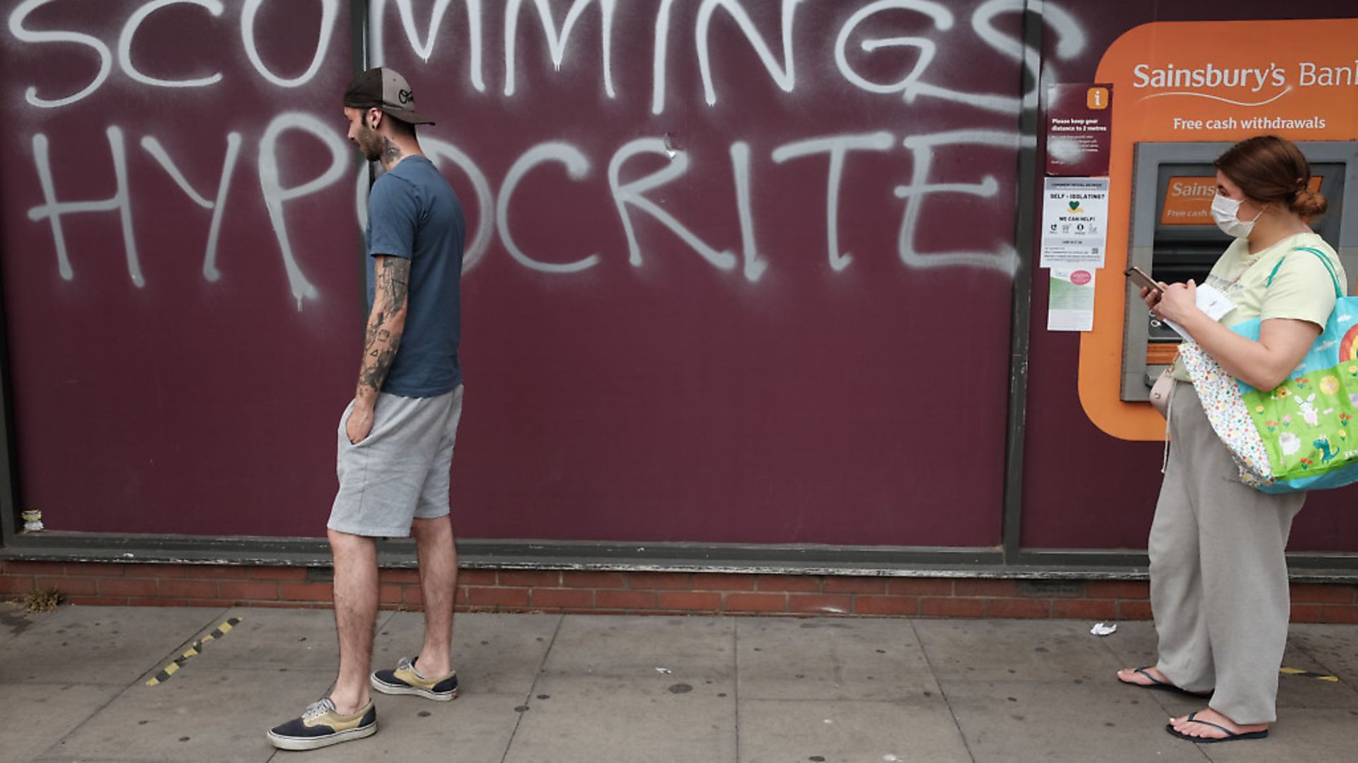 Graffiti protesting against Dominic Cummings is sprayed on a supermarket wall near his north London home, the day after he a gave press conference over allegations he breached coronavirus lockdown restrictions. Picture: Yui Mok/PA Wire - Credit: PA