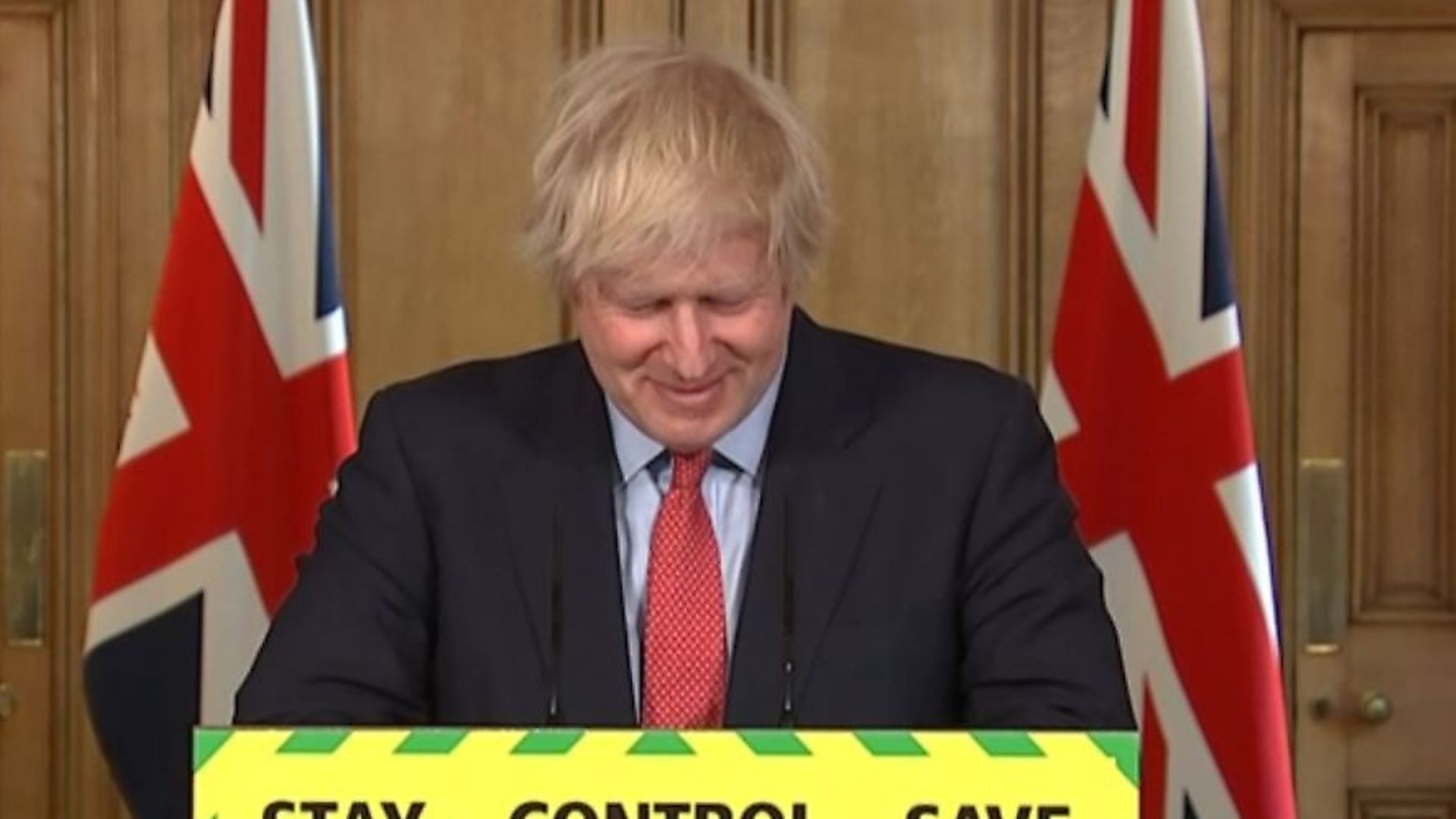 Prime Minister Boris Johnson smiles during a media briefing in Downing Street, London. Photograph: PA Video/PA Wire. - Credit: PA
