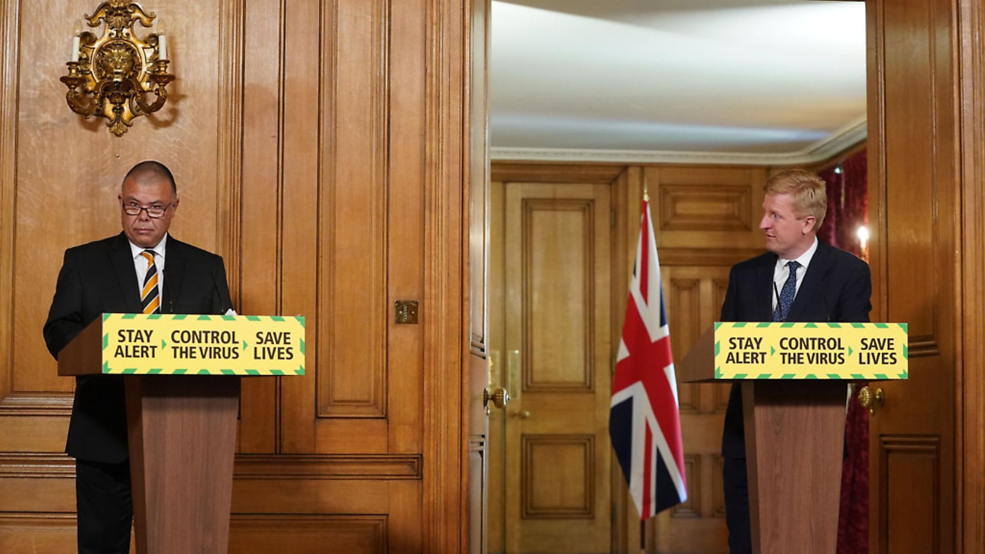 Oliver Dowden (right) and Deputy Chief Medical Officer, Professor Jonathan Van-Tam, during a media briefing in Downing Street. Photograph: Pippa Fowles/10 Downing Street/Crown Copyright/PA Wire

. - Credit: PA