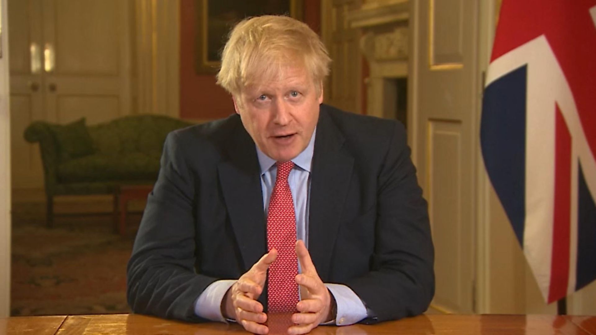 Prime Minister Boris Johnson addressing the nation from 10 Downing Street, London, as he placed the UK on lockdown. Photograph: PA Video. - Credit: PA