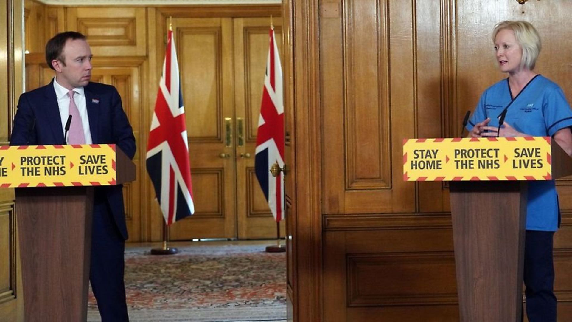 Chief nursing officer Ruth May with health secretary Matt Hancock at the Downing Street briefing. Photograph: Downing Street. - Credit: Archant