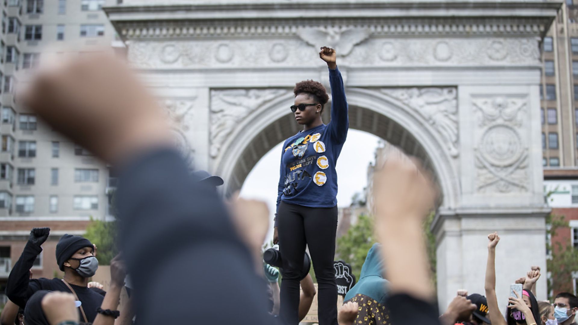 GLOBAL OUTRAGE: Demonstrators protest against the killing of George Floyd in WAshington Square Park. - Credit: Corbis via Getty Images