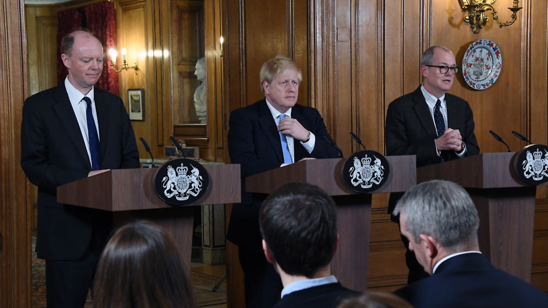 Prime Minister Boris Johnson, alongside Chief Medical Officer for England Chris Whitty (left) and Chief Scientific Adviser Sir Patrick Vallance (right), during a press conference at Downing Street. Photograph: Alberto Pezzali/PA. - Credit: PA