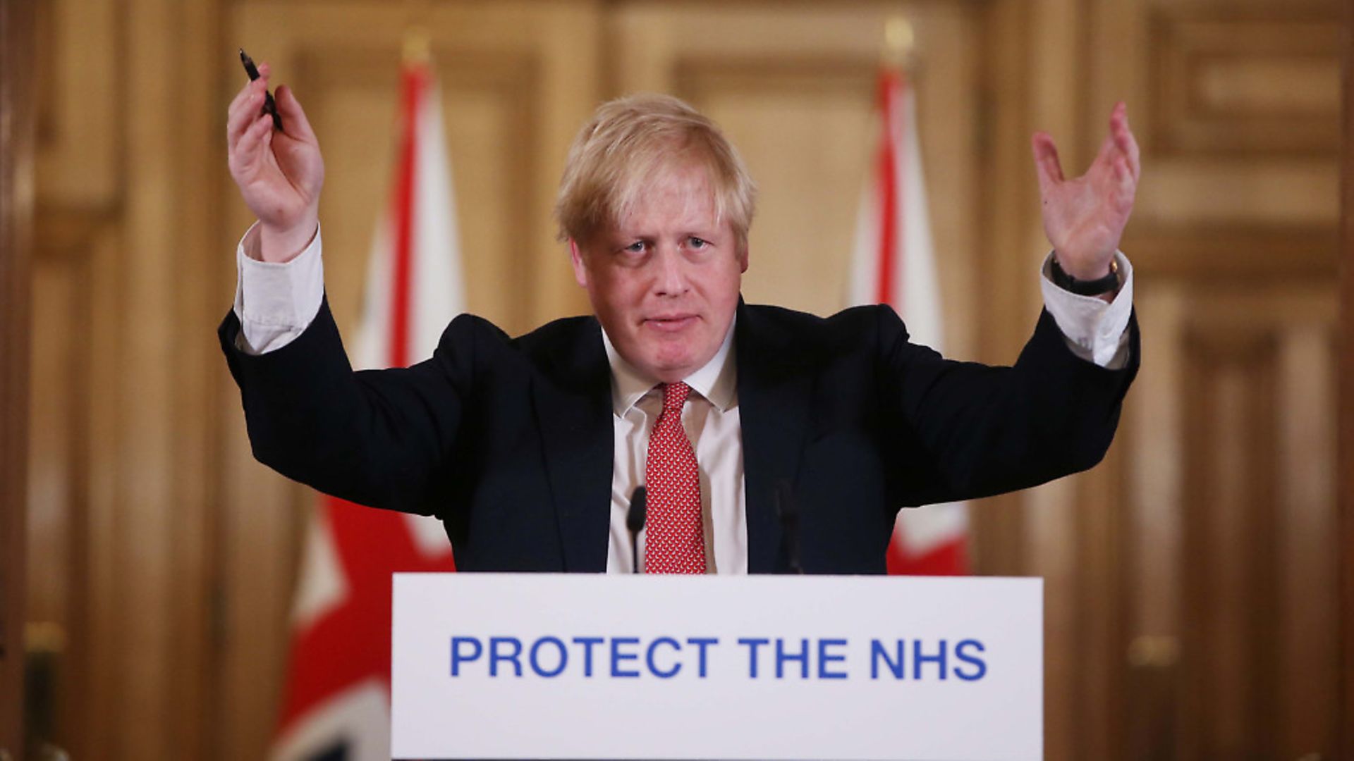 LONDON, ENGLAND - MARCH 22: British Prime Minister Boris Johnson gives his daily COVID 19 press briefing at Downing Street on March 22, 2020 in London, England. Coronavirus (COVID-19) pandemic has spread to at least 182 countries, claiming over 10,000 lives and infecting hundreds of thousands more. (Photo by Ian Vogler-WPA Pool/Getty Images) - Credit: Getty Images