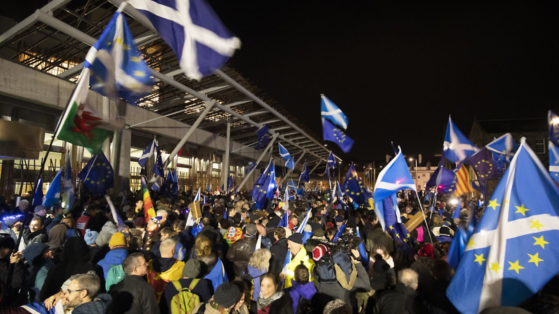 Pro-EU campaigners take part in a 'Missing EU Already' rally outside the Scottish Parliament. Photograph: Jane Barlow/PA. - Credit: PA