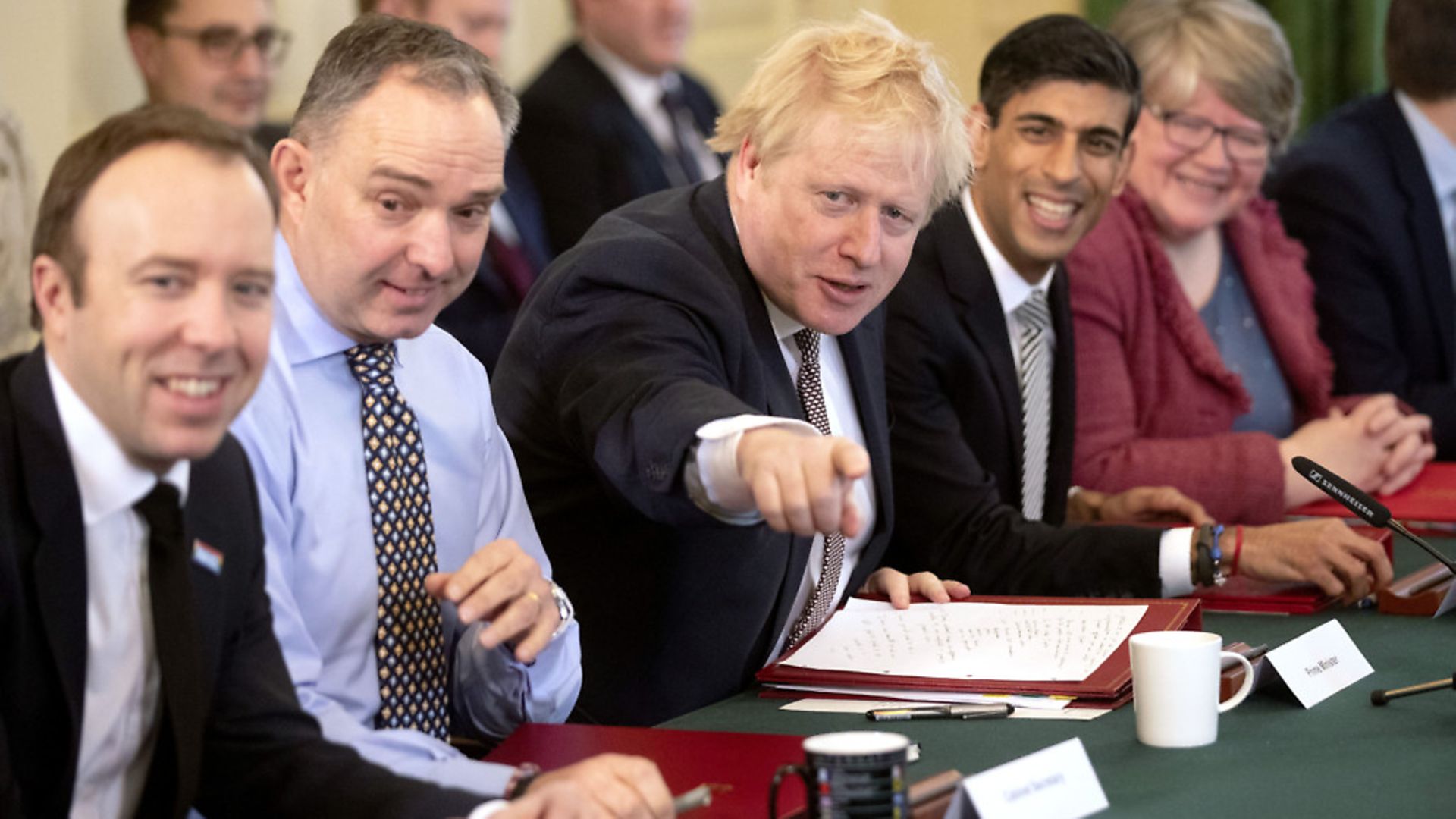 Boris Johnson (centre), alongside new chancellor of the Exchequer Rishi Sunak (second right), cabinet secretary Mark Sedwill (second left), work and pensions secretary Therese Coffey (right) and health secretary Matt Hancock (left) during the first Cabinet meeting at 10 Downing Street. Photograph: Matt Dunham/PA Wire. - Credit: PA