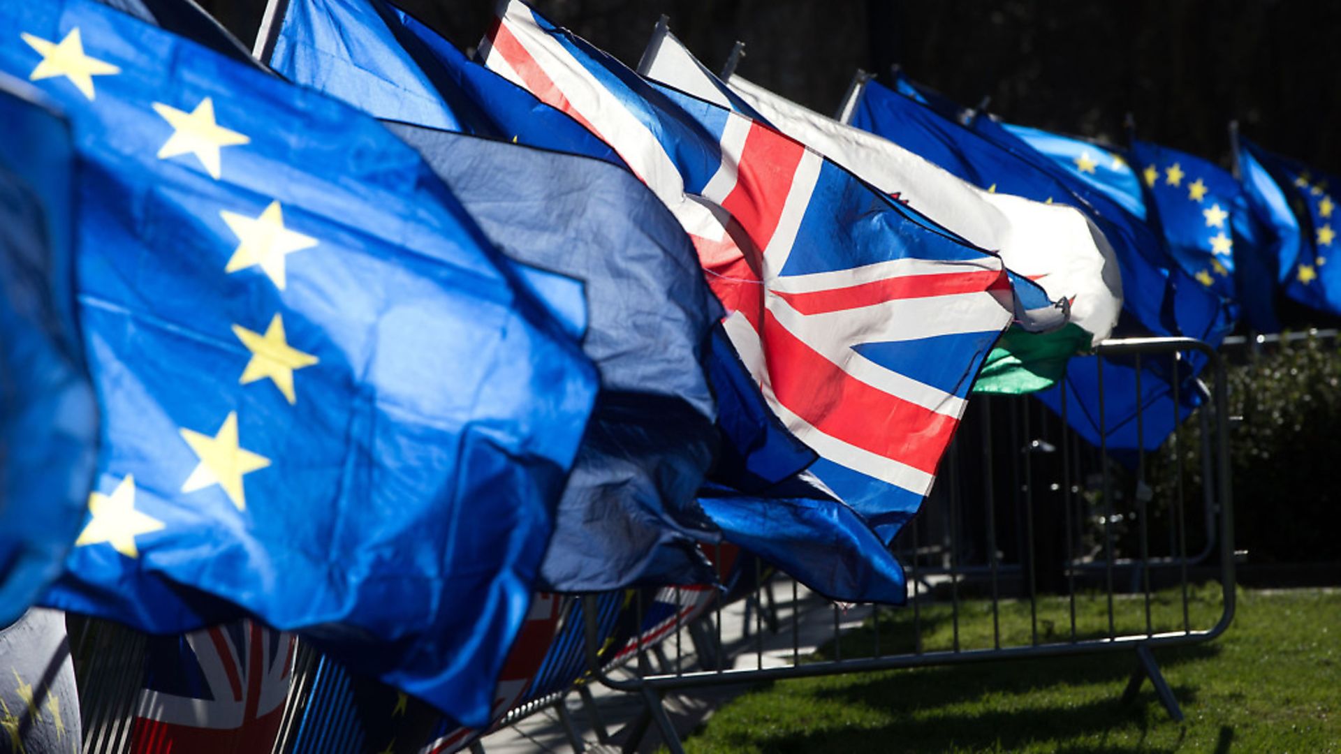 European flags appear alongside the union flag as campaigners fight against Brexit. Photograph: Jonathan Brady/PA. - Credit: PA
