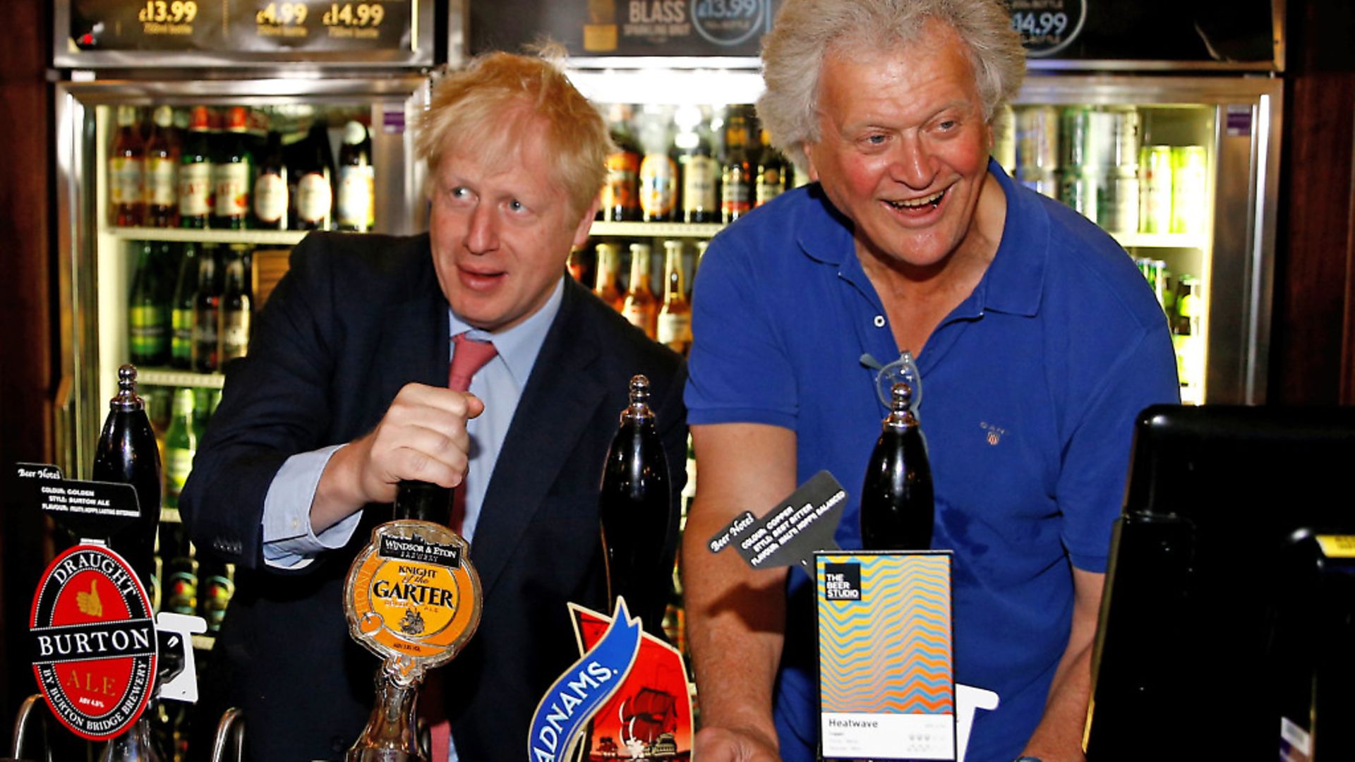 Tim Martin, Chairman of JD Wetherspoon with Prime Minister Boris Johnson during a visit to Wetherspoons Metropolitan Bar in London. Photo: Henry Nicholls / PA - Credit: PA Wire/PA Images