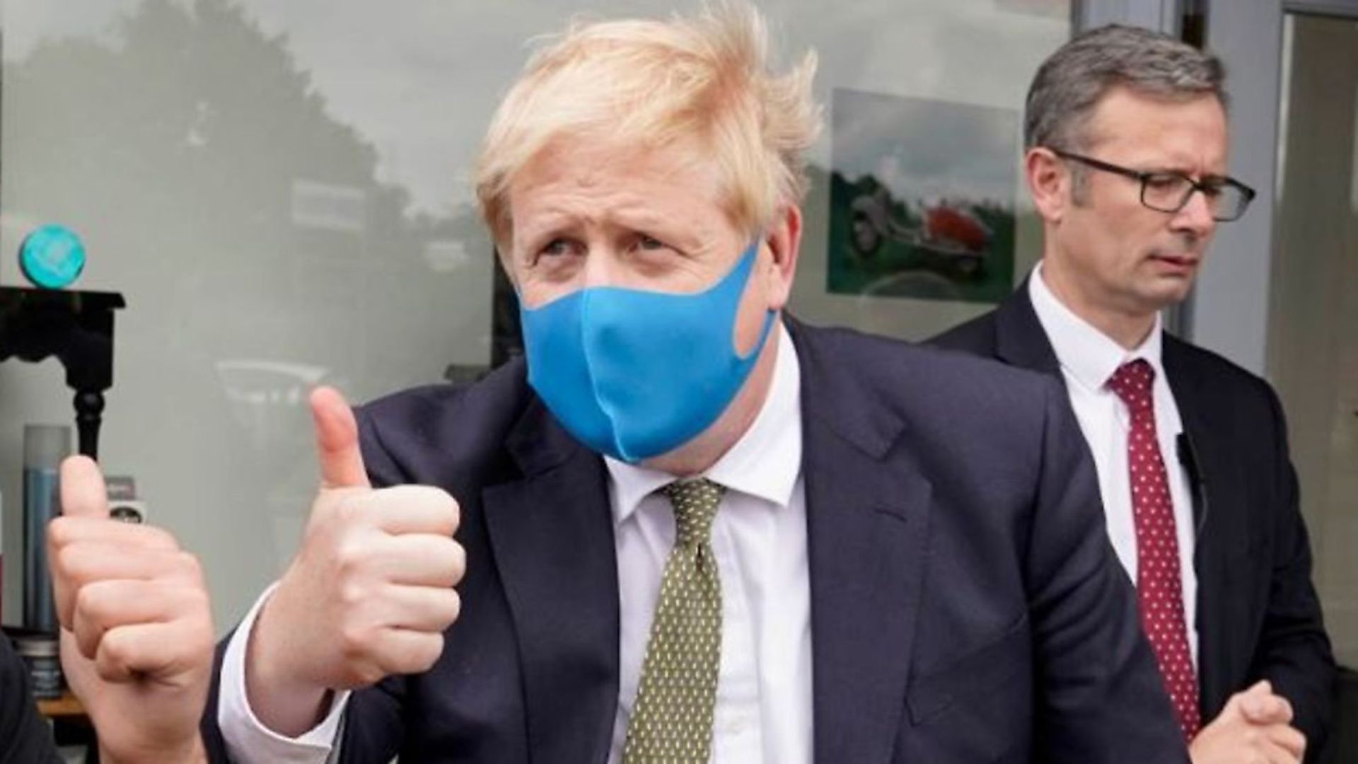 Boris Johnson wears a mask as he poses for a Twitter picture. Photograph: Twitter. - Credit: Archant